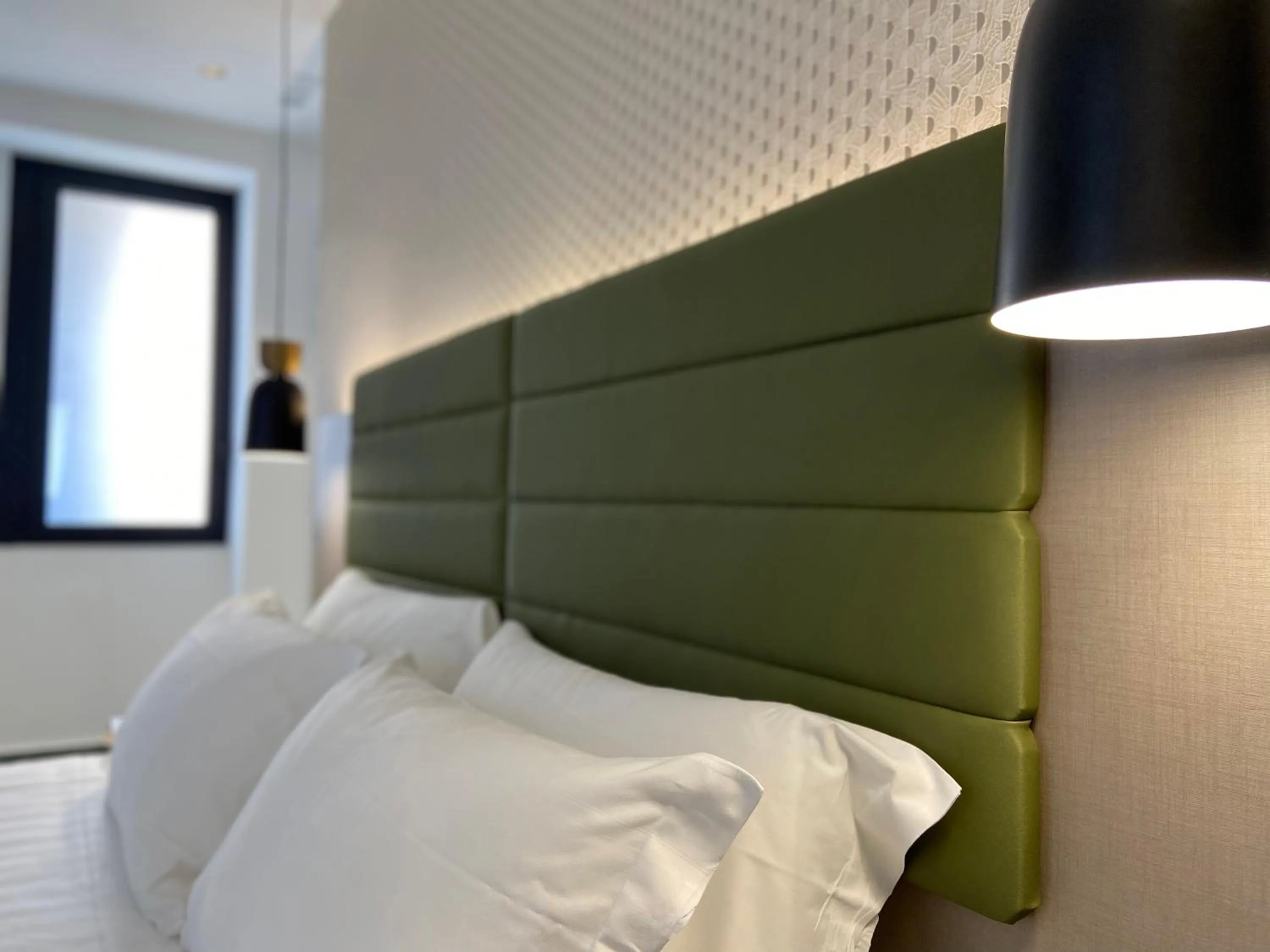 Bed in Salemare Rooms & Suites