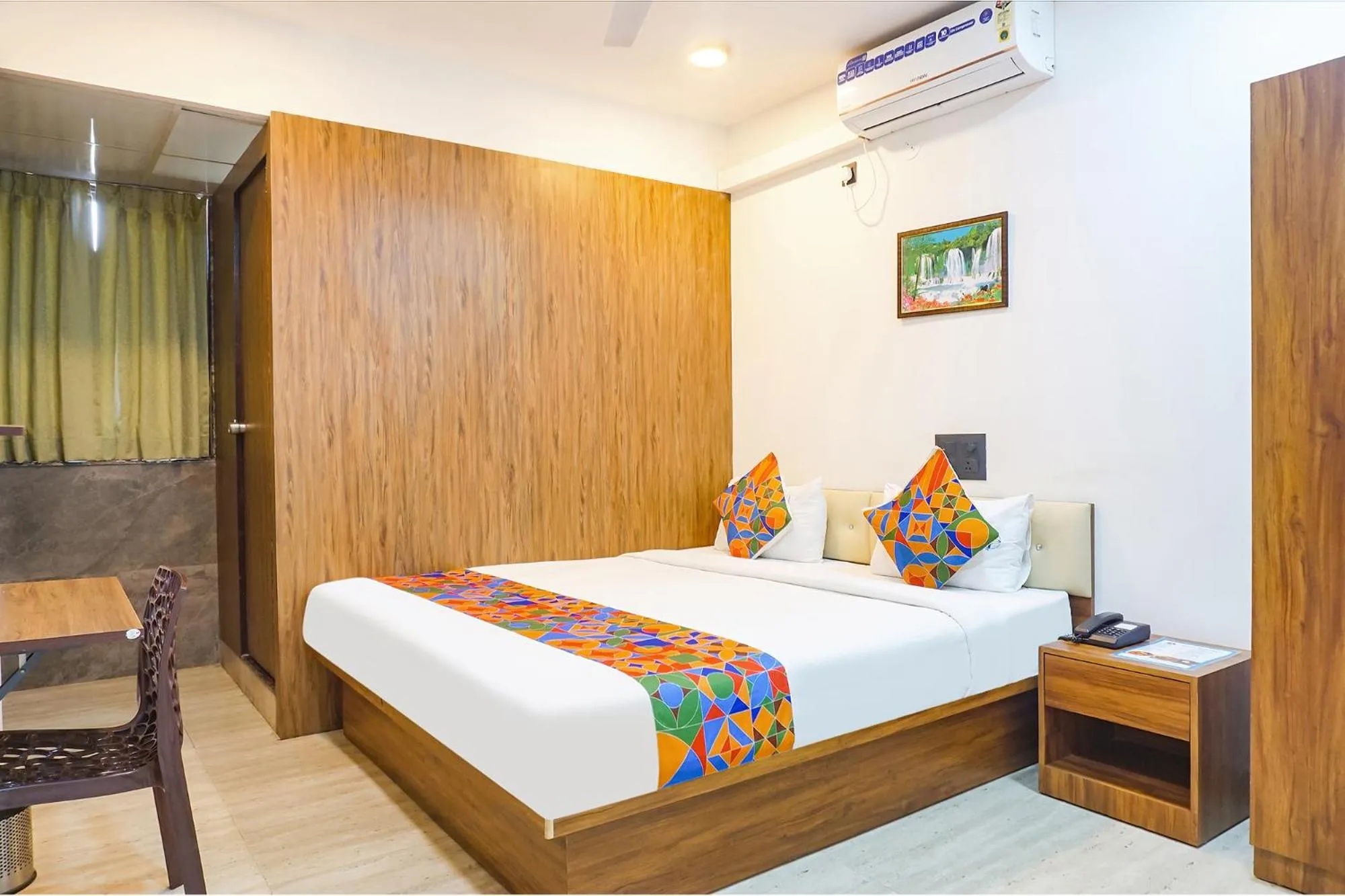 Bed in FabHotel Atithi Regency