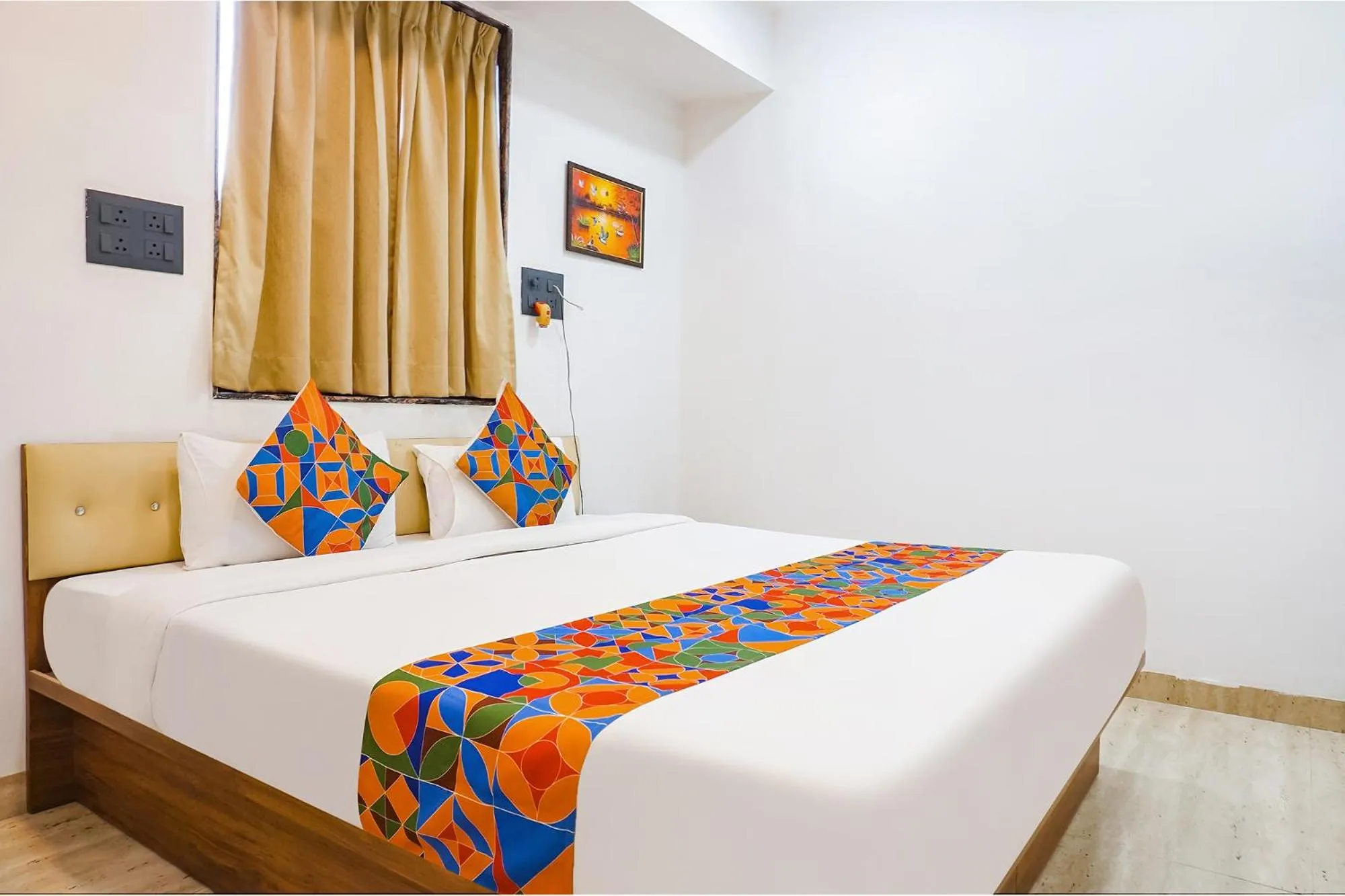 Bed in FabHotel Atithi Regency
