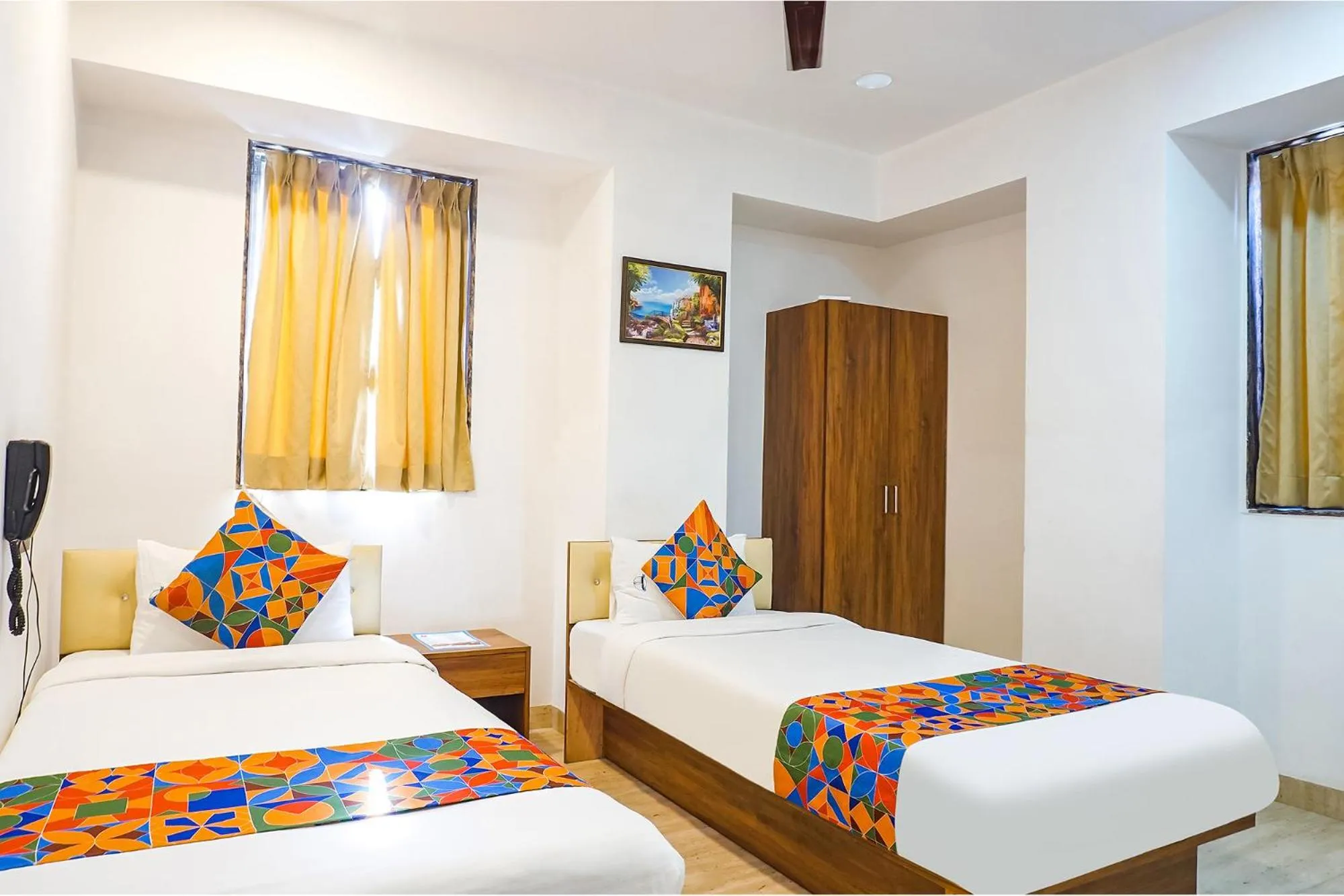 Bed in FabHotel Atithi Regency