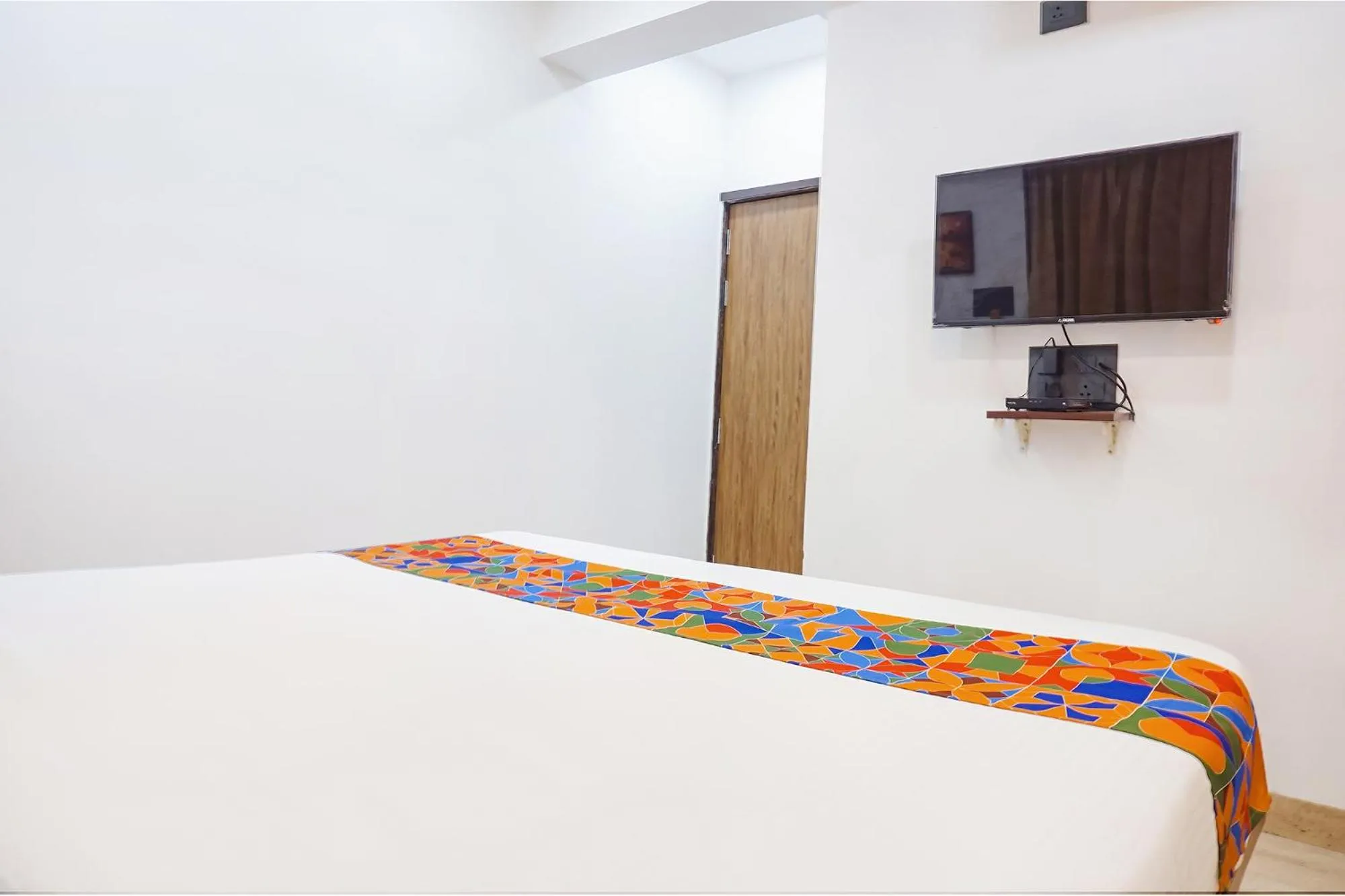 Bed in FabHotel Atithi Regency