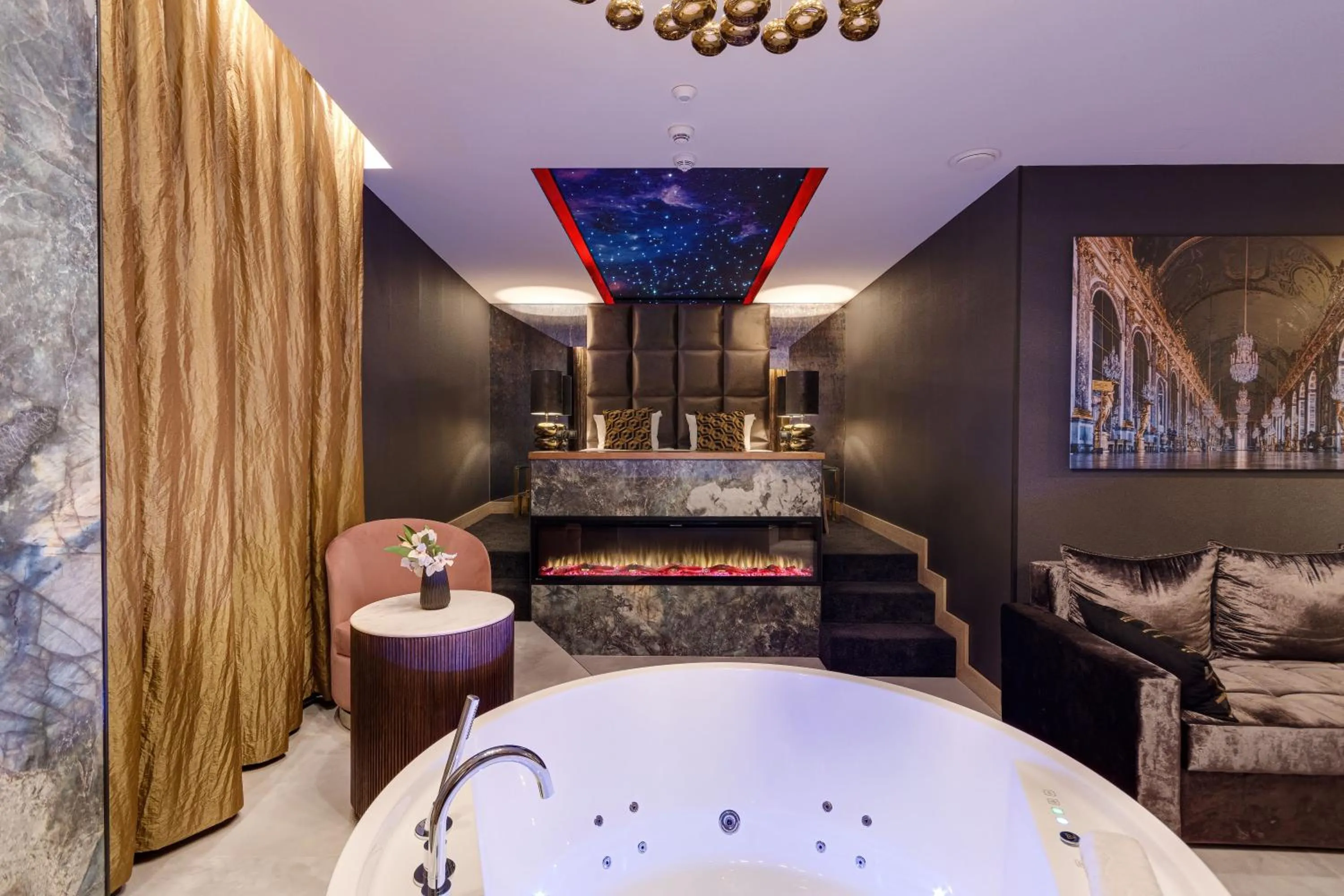 Bed in Art Suites Luxury Hotel