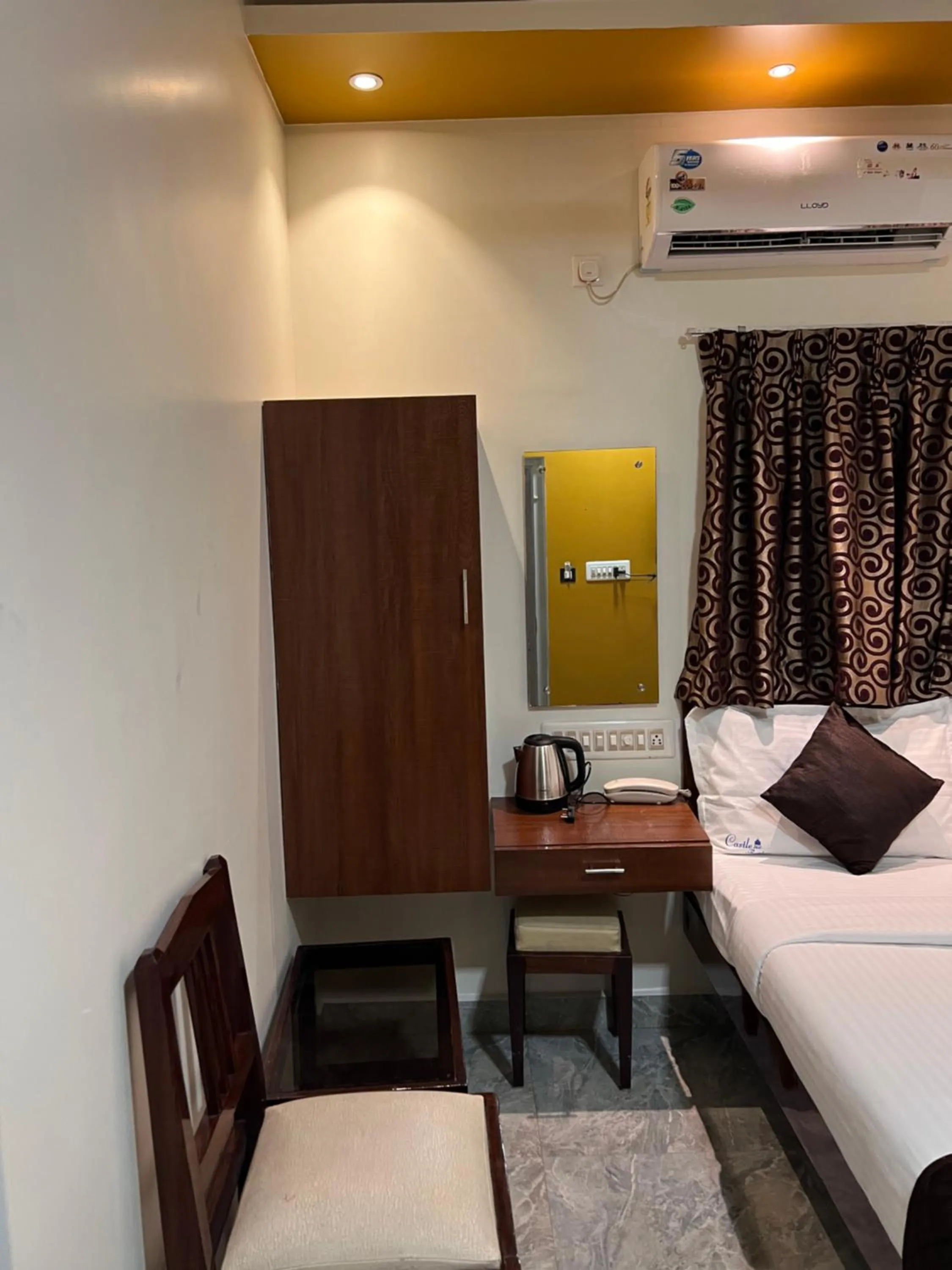 Living room, Bed in Castle 360 Residency