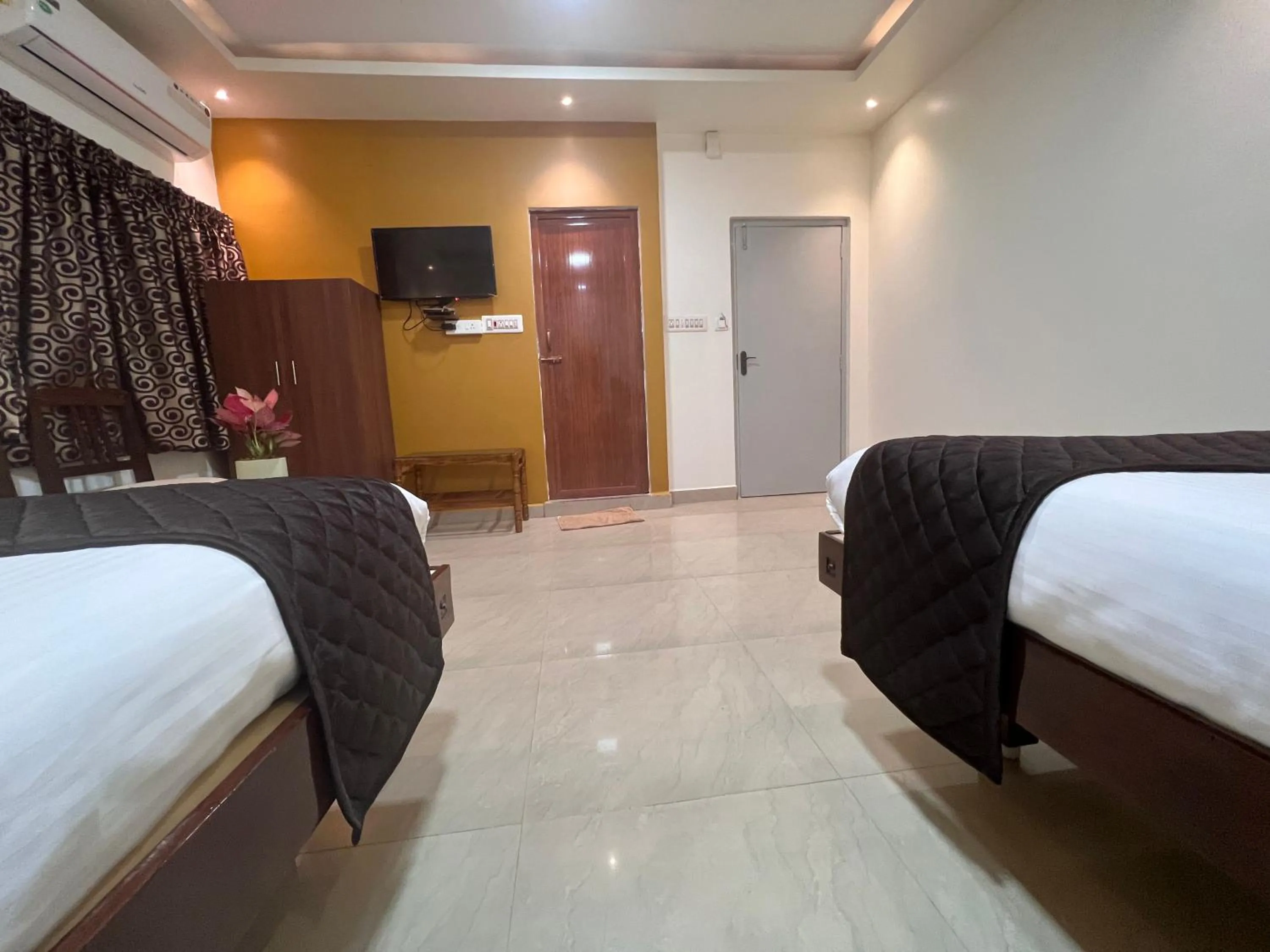 Communal lounge/ TV room, Bed in Castle 360 Residency