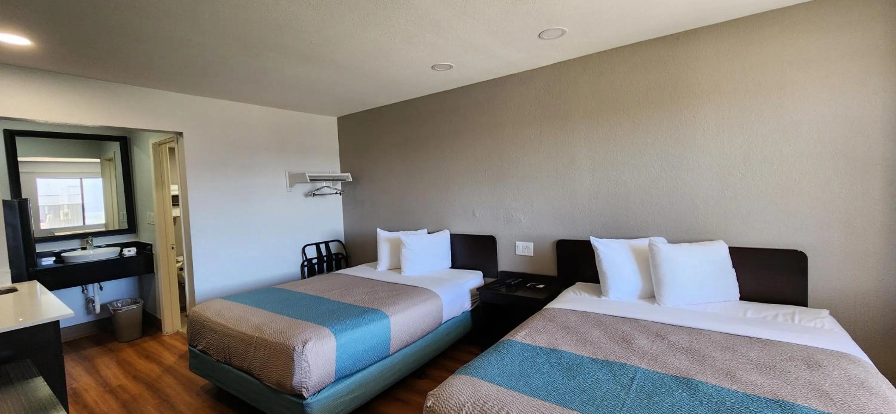 Bed in Studio 6 Webster TX Houston NASA Lake