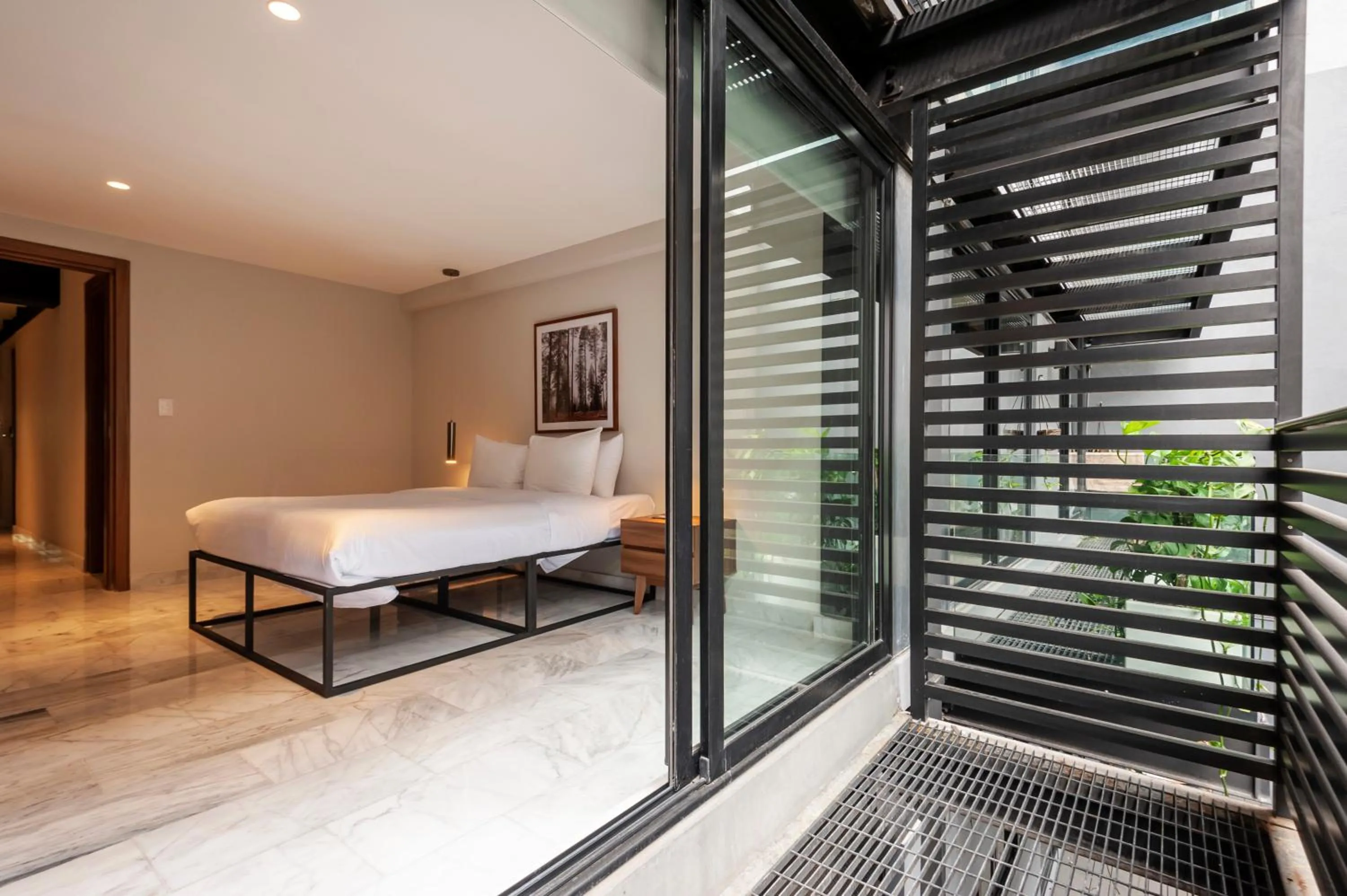 Bedroom in Arquimedes 138 by Wynwood House