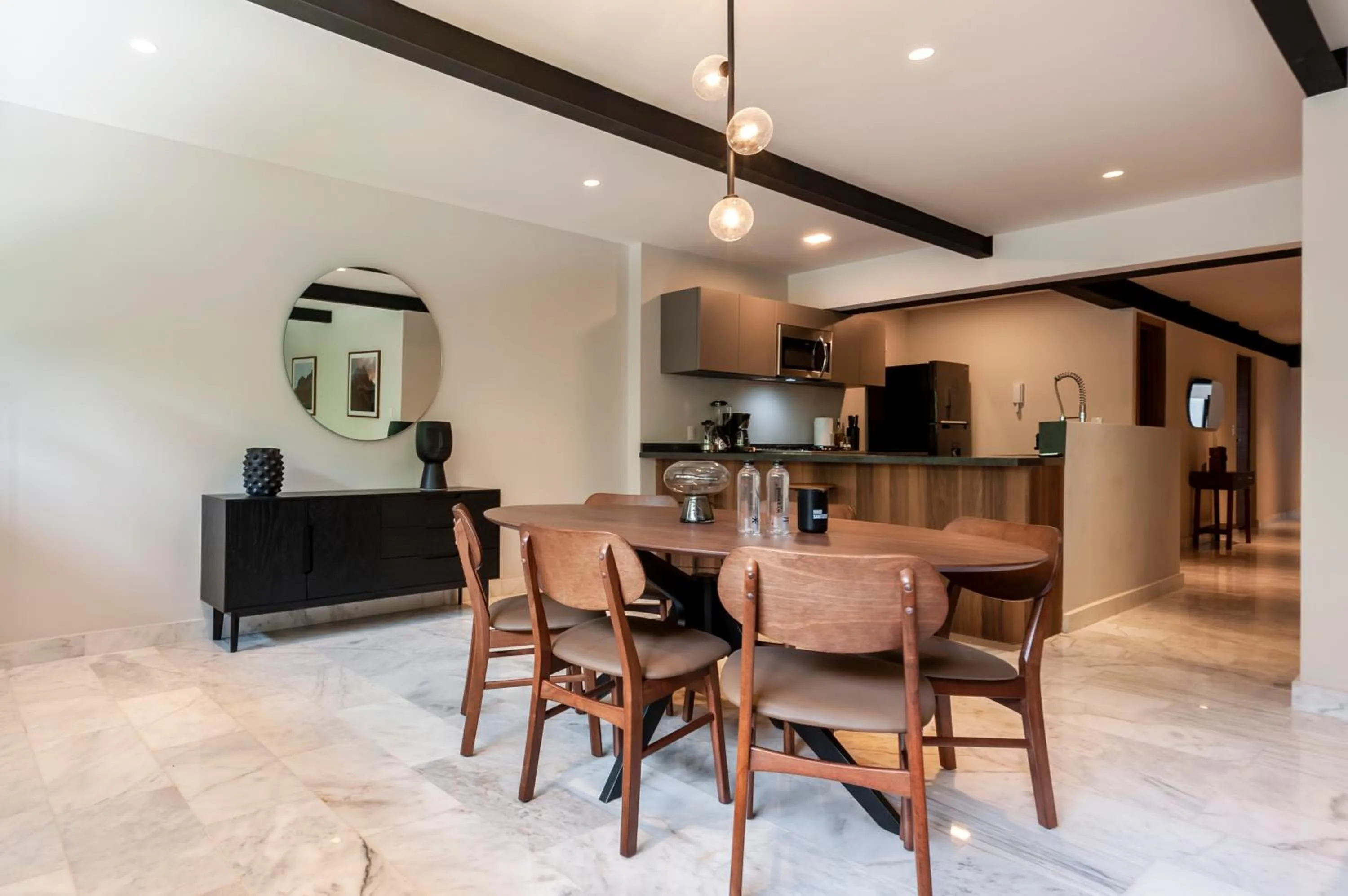 Dining area in Arquimedes 138 by Wynwood House