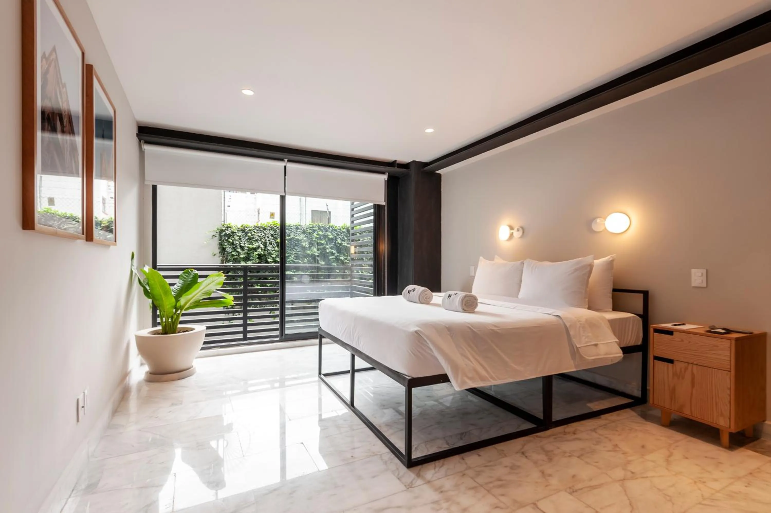 Bedroom in Arquimedes 138 by Wynwood House