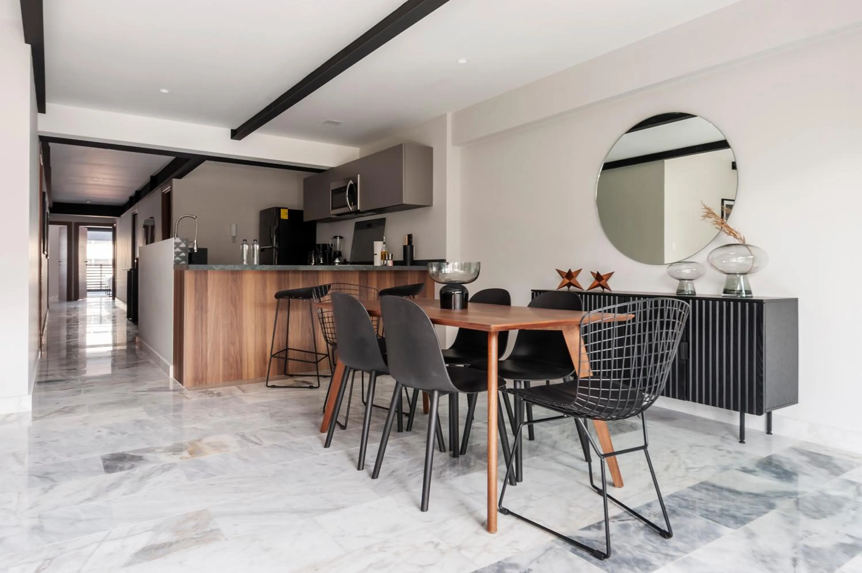 Dining area in Arquimedes 138 by Wynwood House