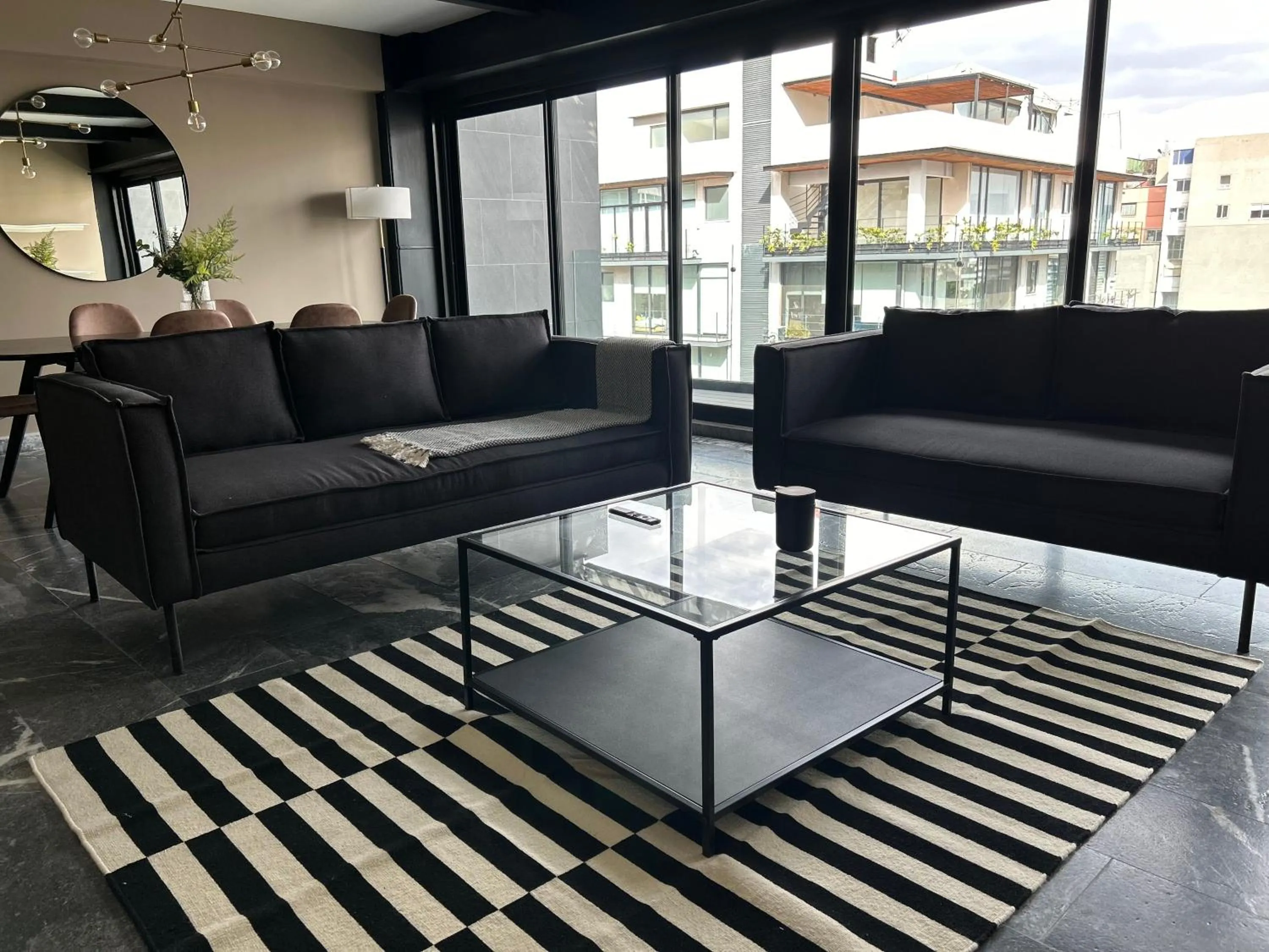 Seating area in Arquimedes 138 by Wynwood House