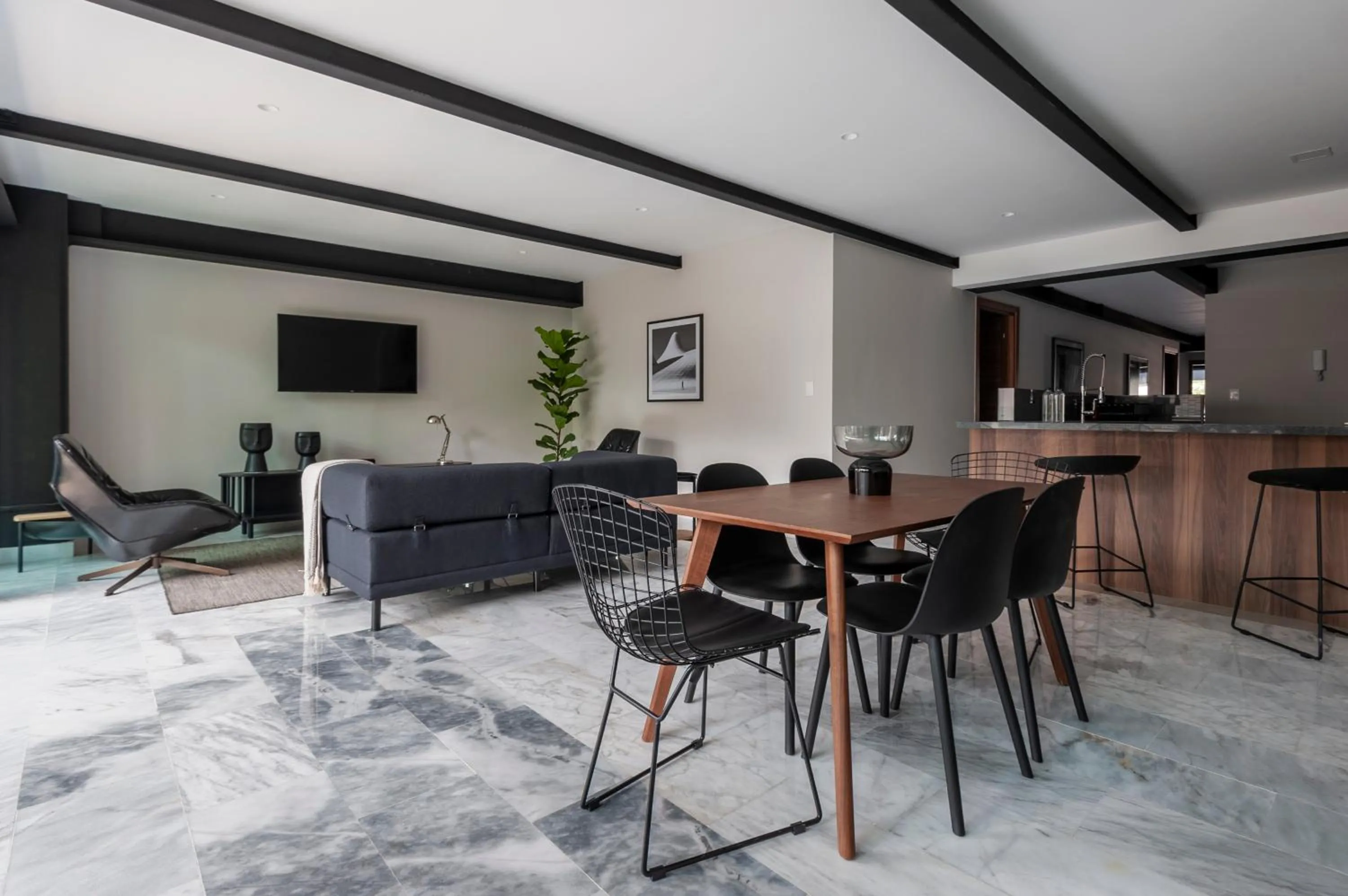 Dining area in Arquimedes 138 by Wynwood House