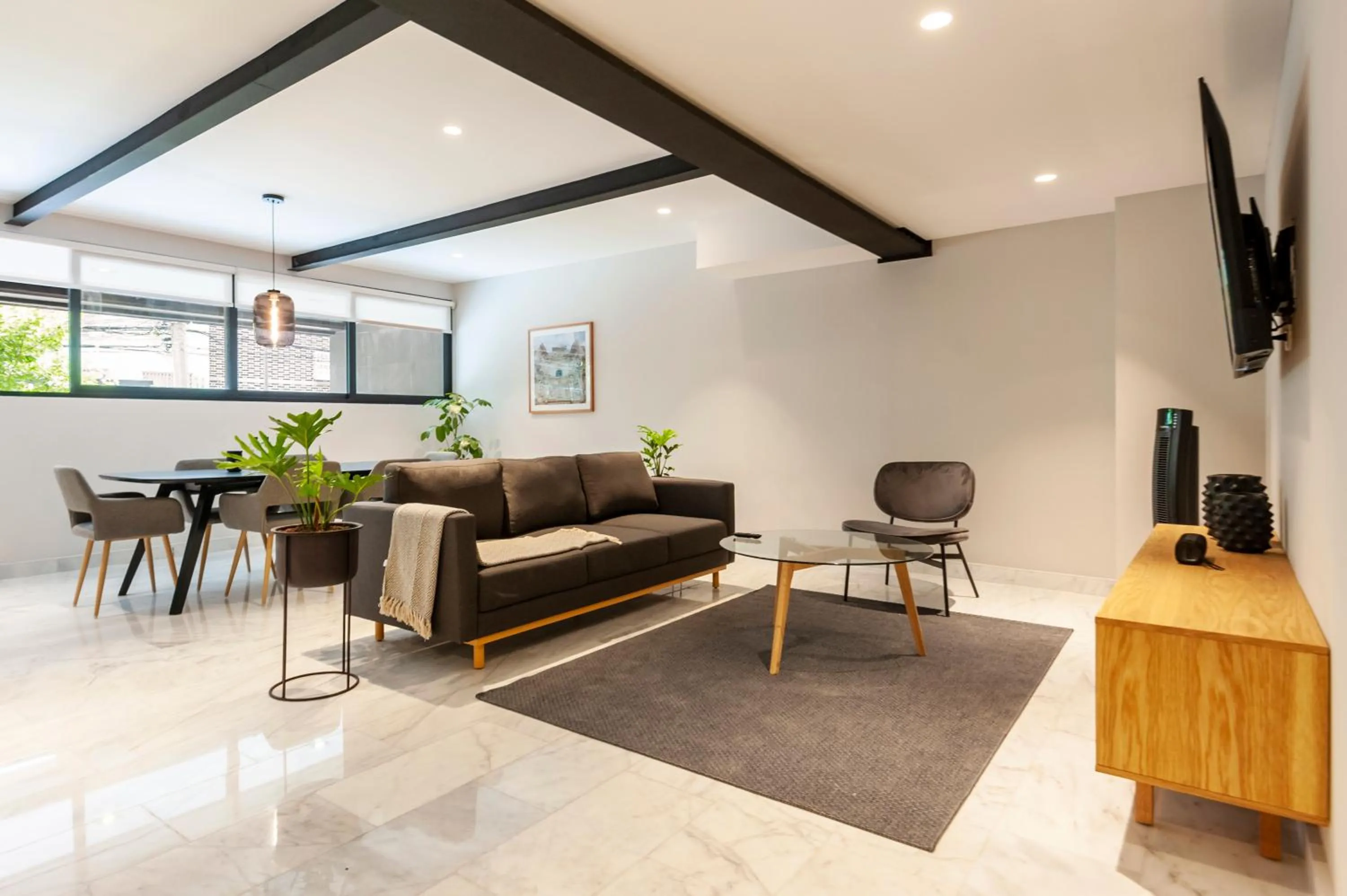 Living room in Arquimedes 138 by Wynwood House