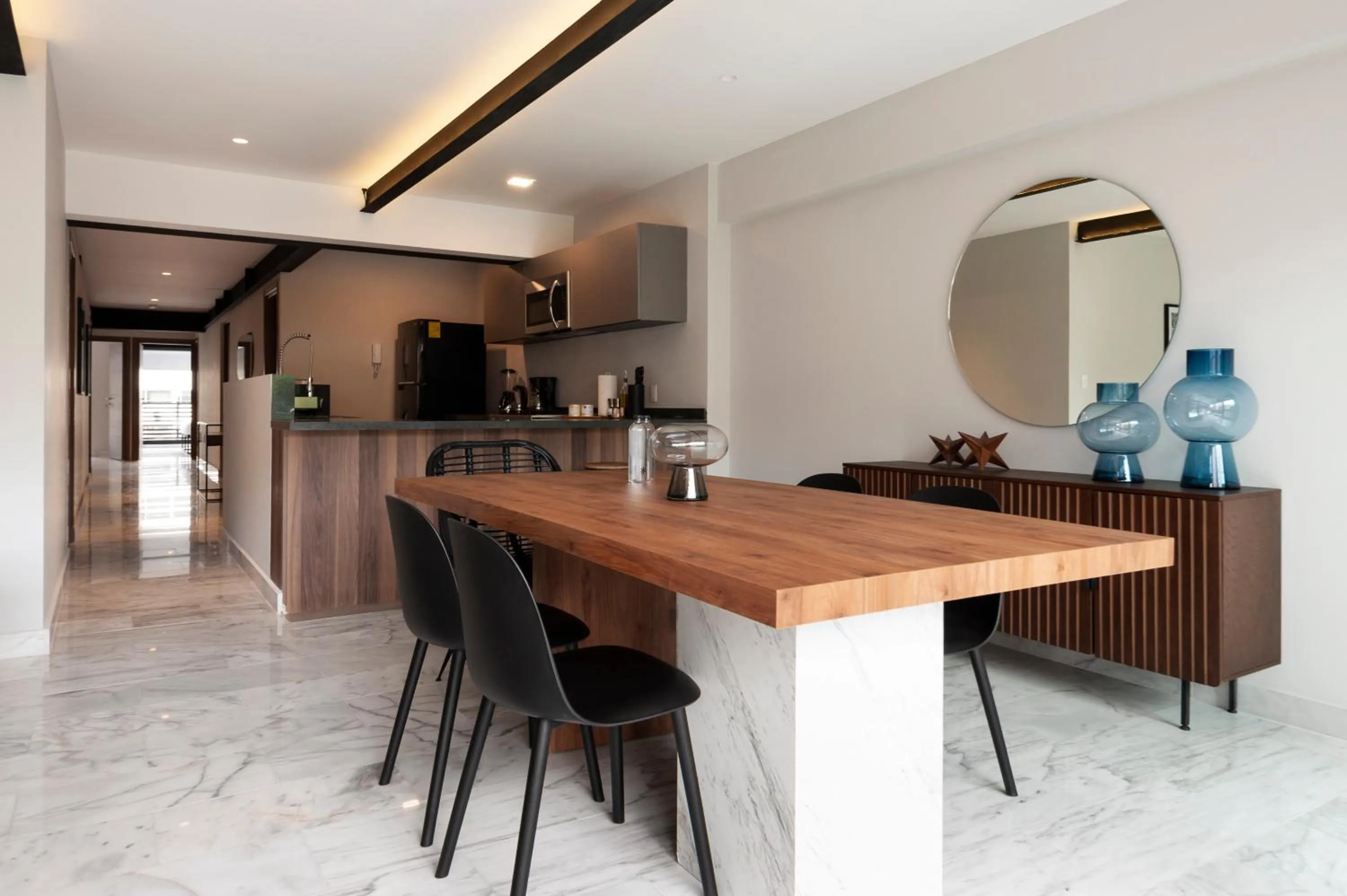 Dining area in Arquimedes 138 by Wynwood House