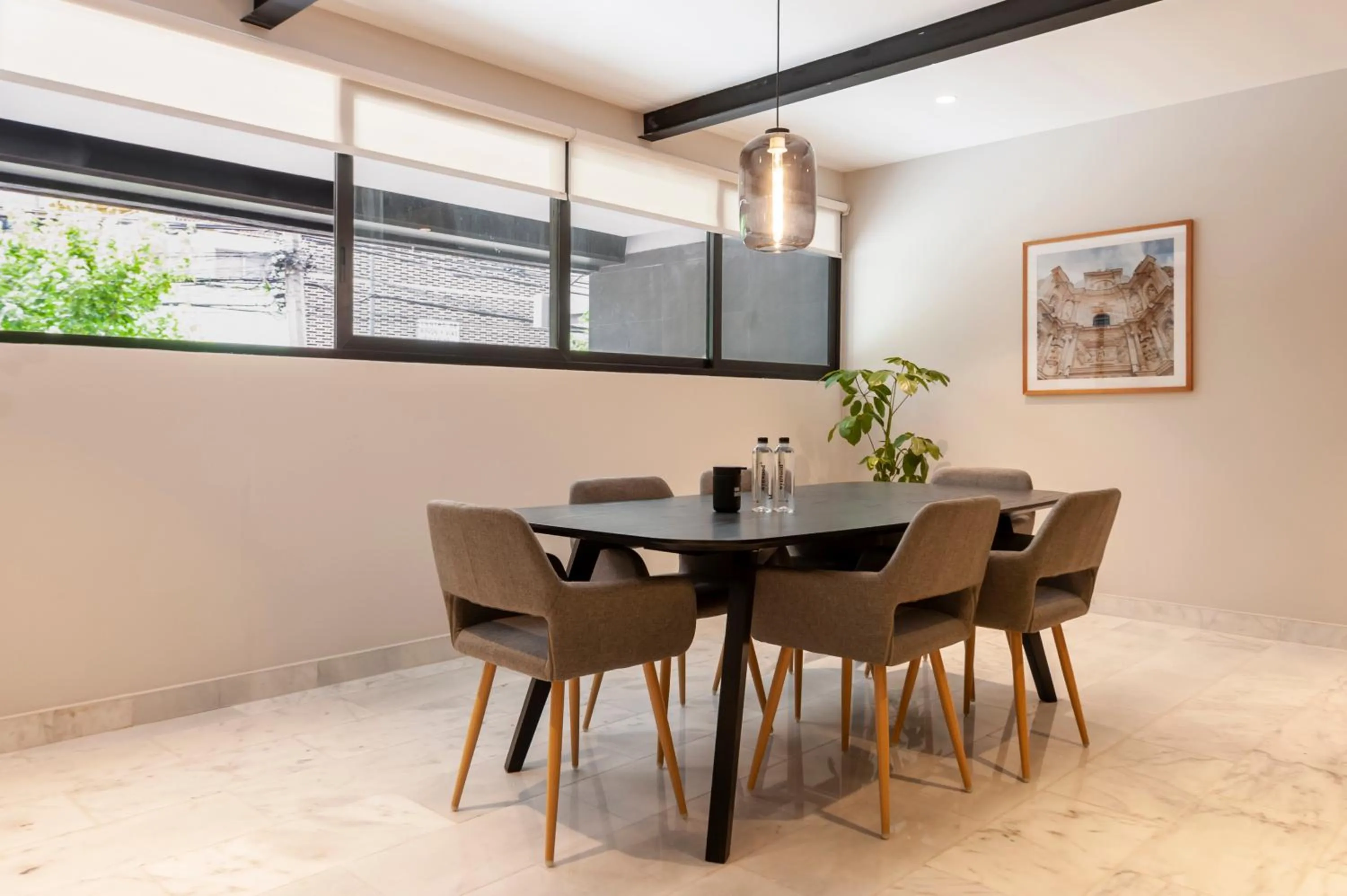 Dining area in Arquimedes 138 by Wynwood House