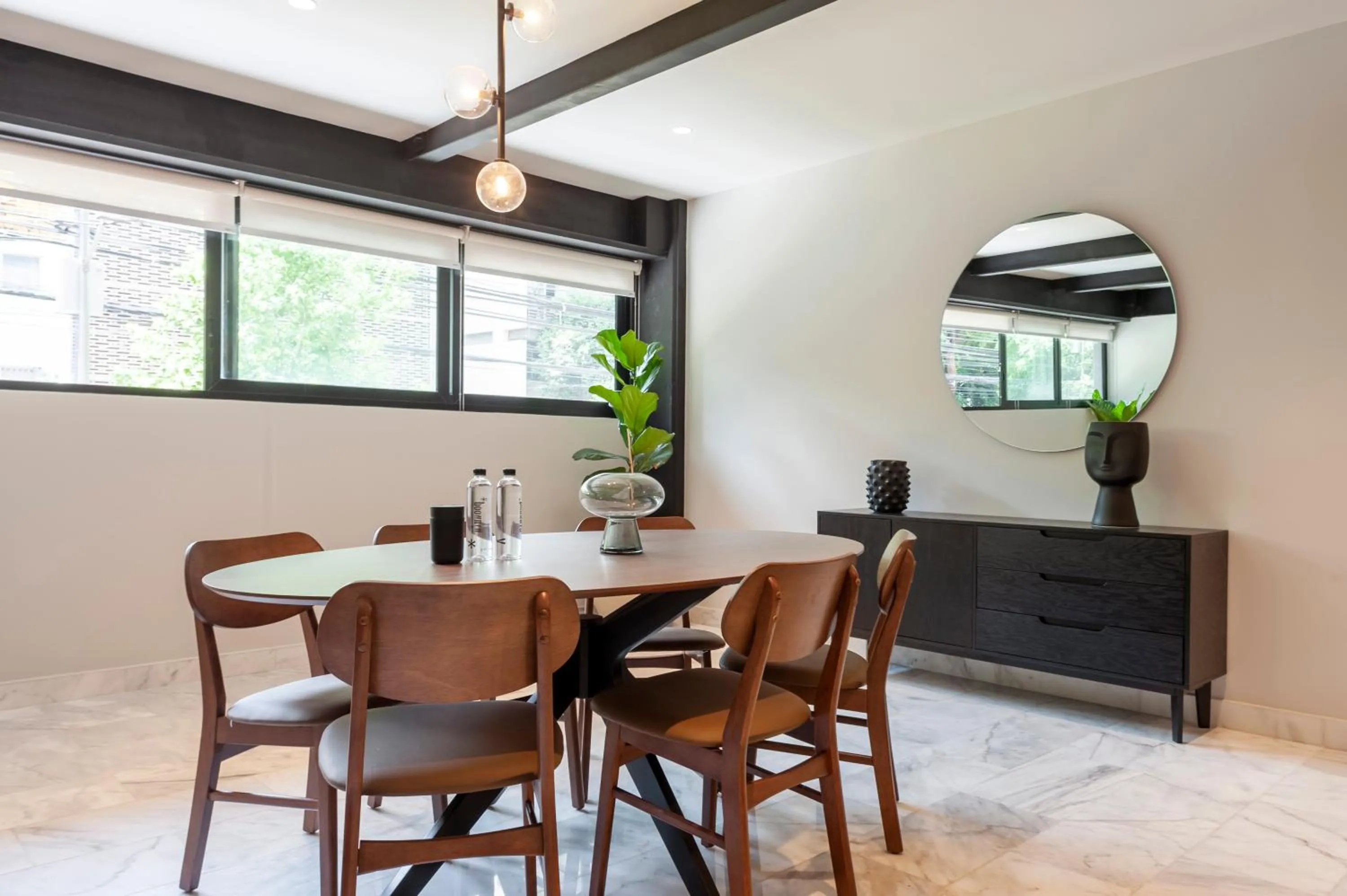 Dining area in Arquimedes 138 by Wynwood House