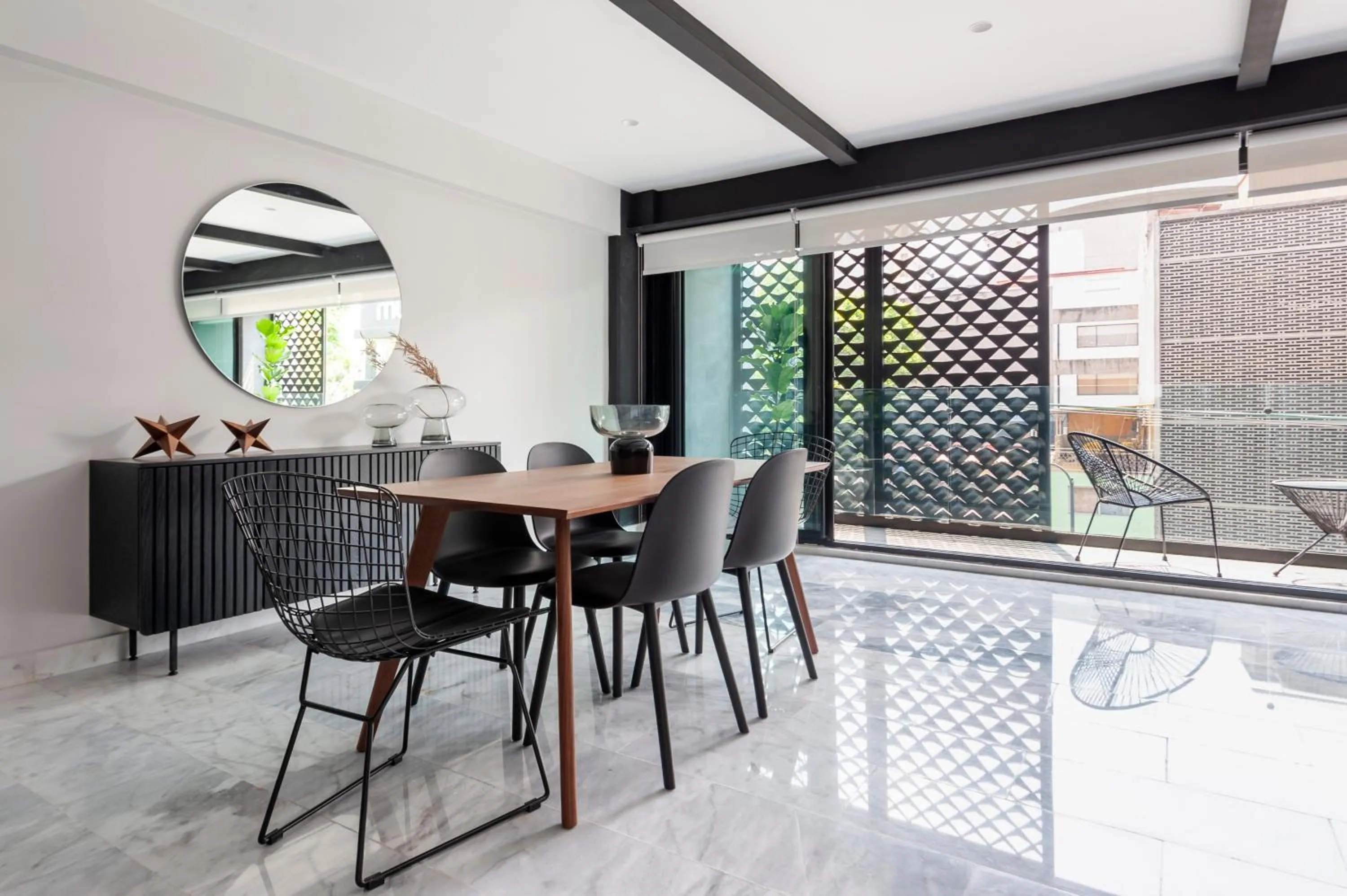 Dining area in Arquimedes 138 by Wynwood House