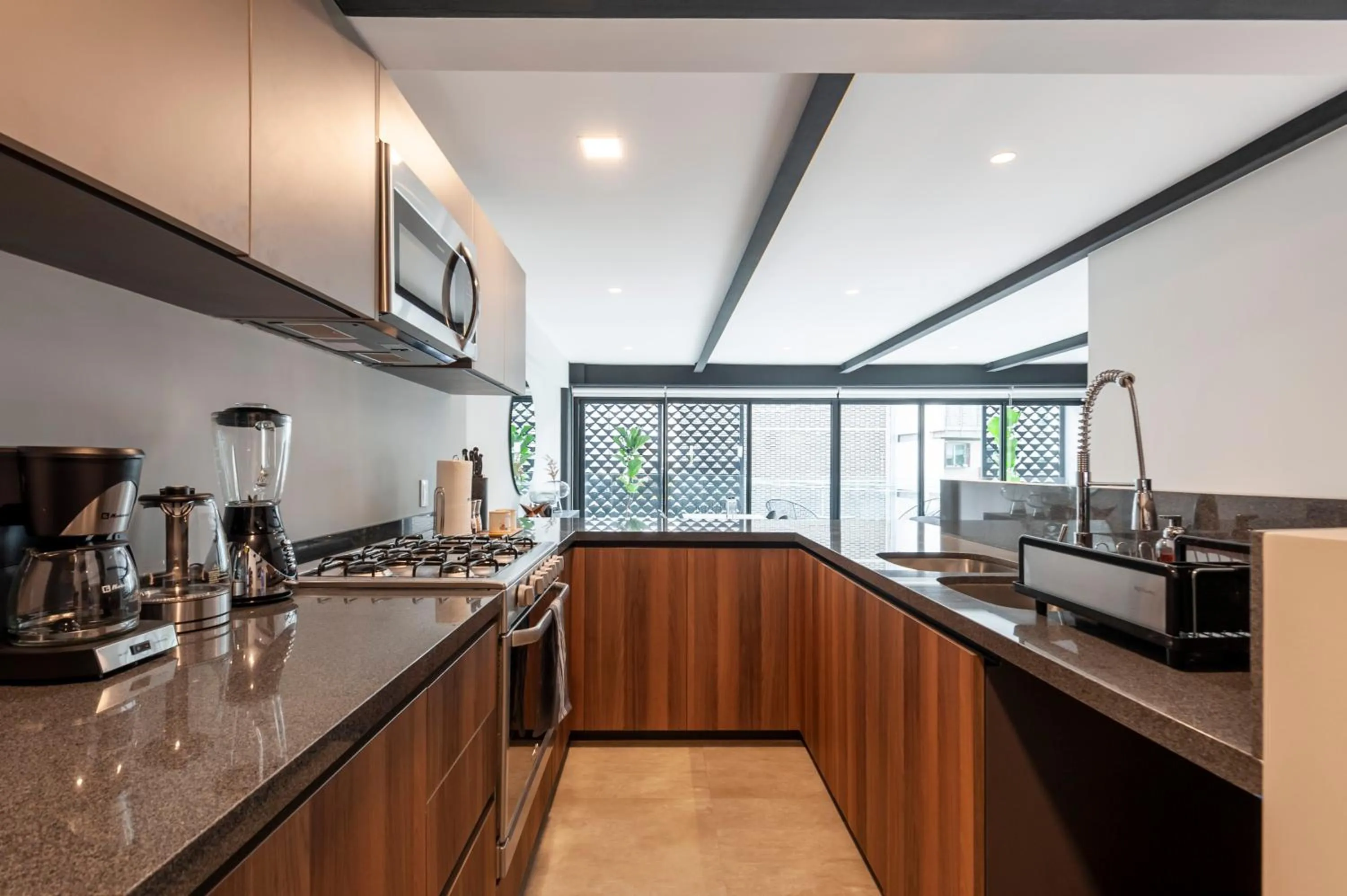 Kitchen or kitchenette in Arquimedes 138 by Wynwood House