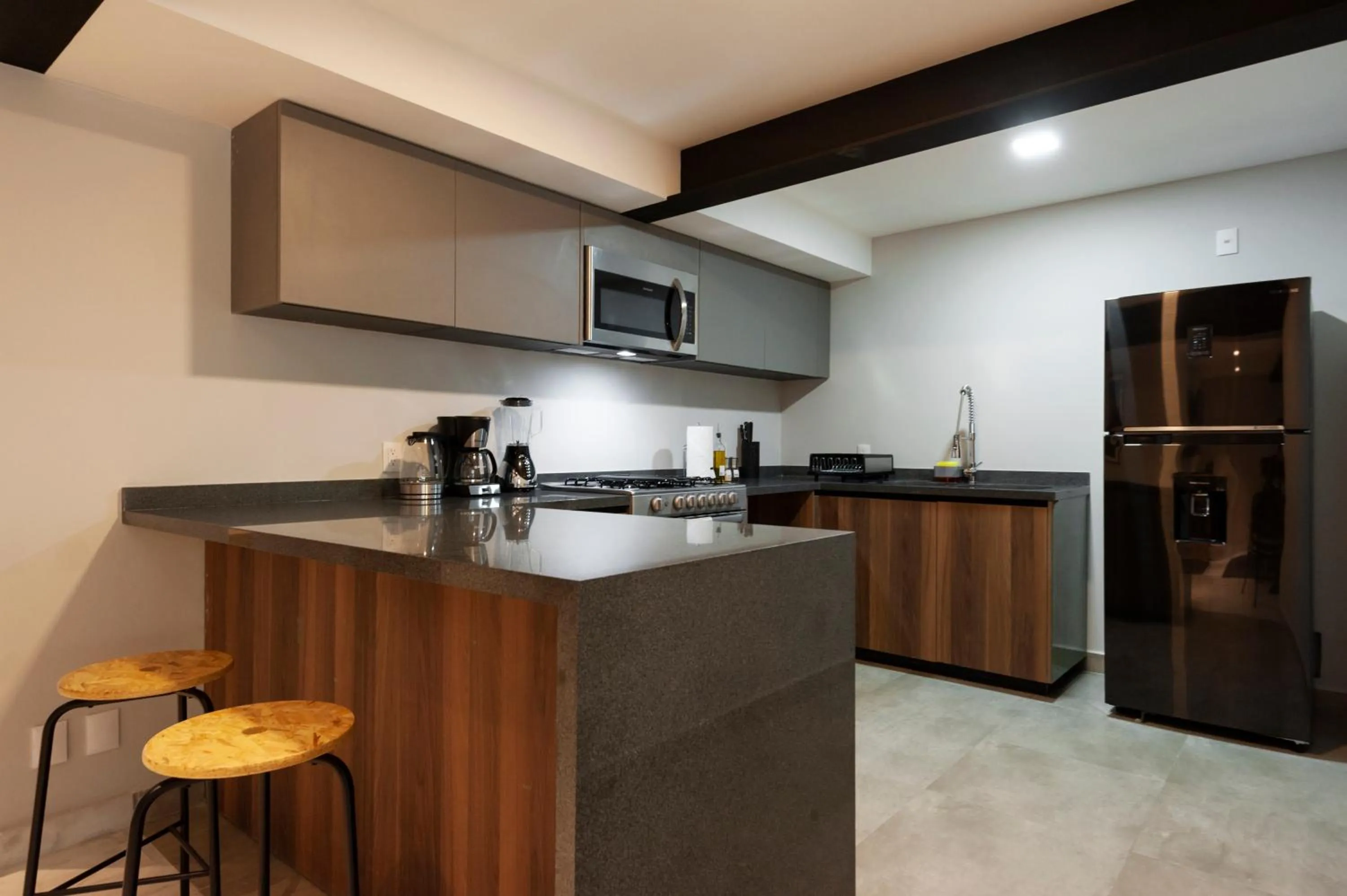 Kitchen or kitchenette in Arquimedes 138 by Wynwood House
