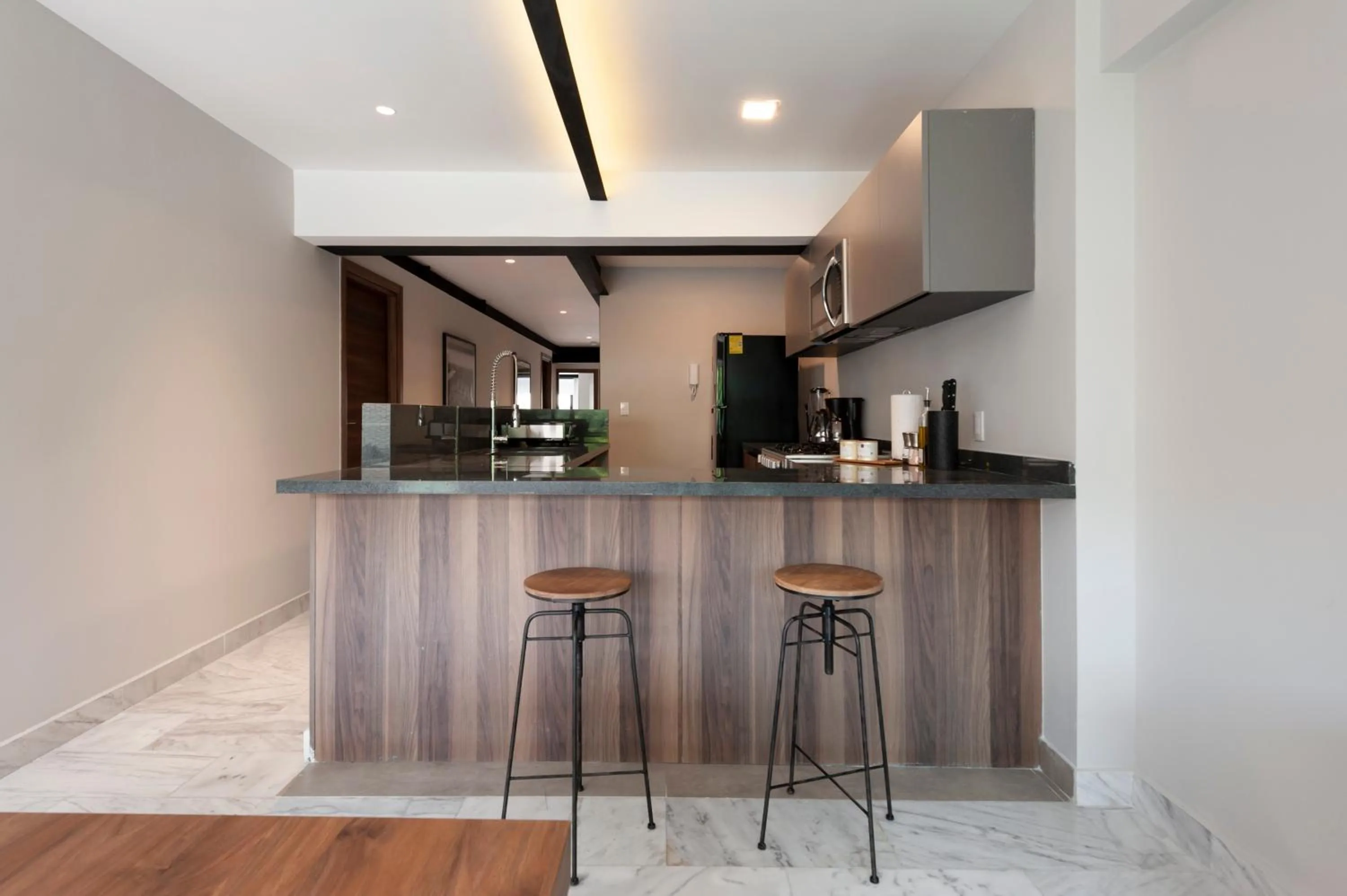 Kitchen or kitchenette in Arquimedes 138 by Wynwood House