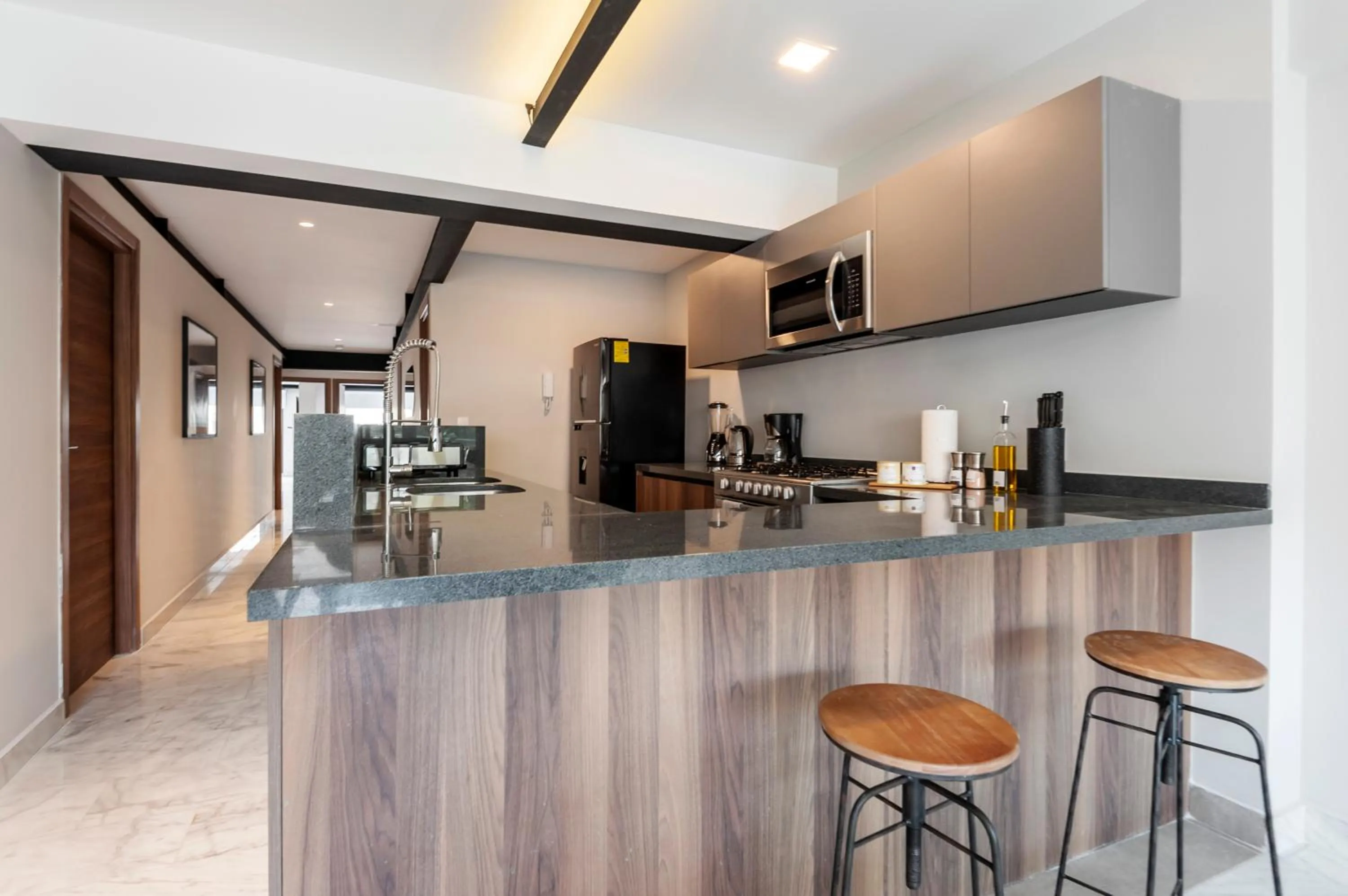 Kitchen or kitchenette in Arquimedes 138 by Wynwood House