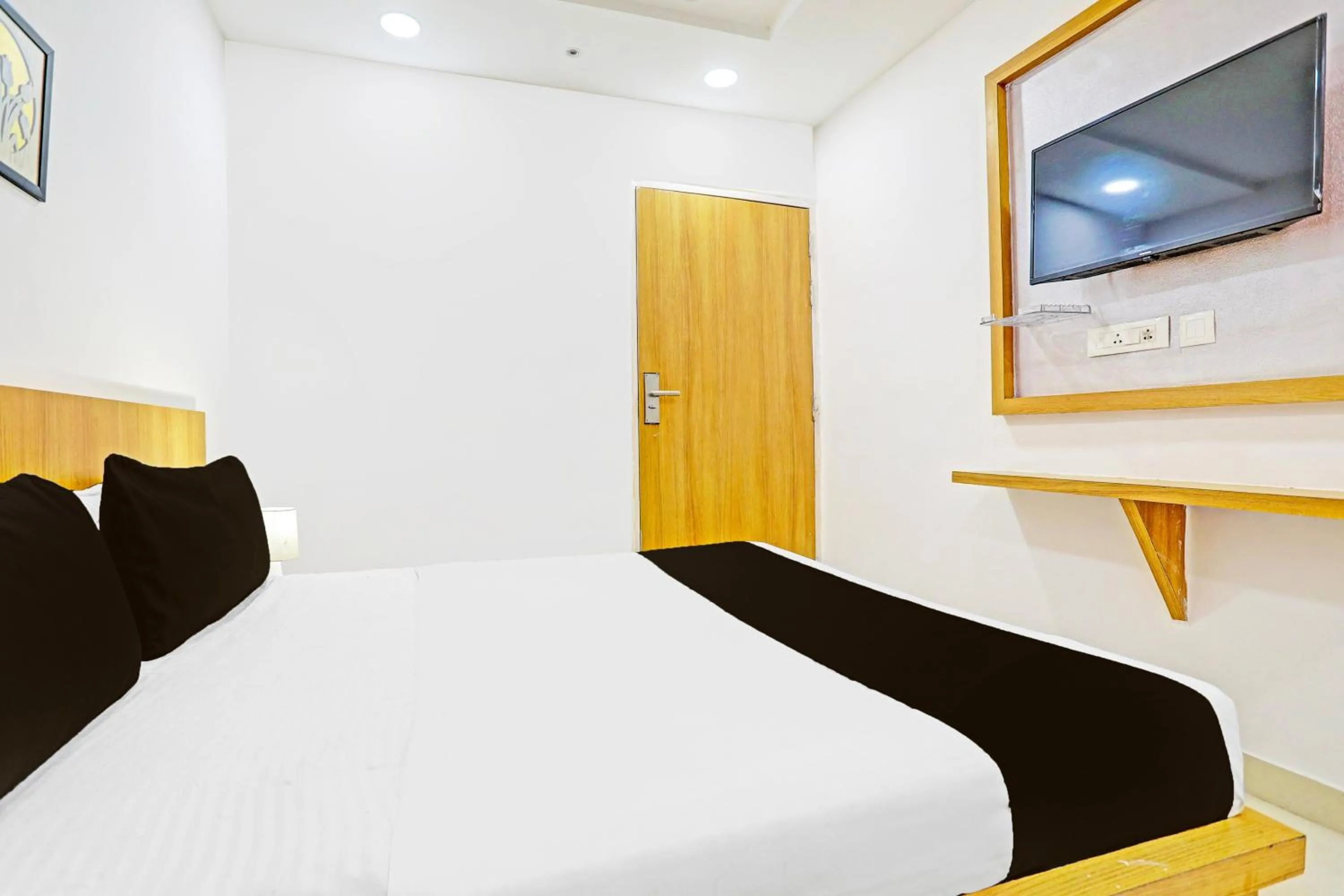 Bedroom, Bed in Super Hotel O Raipur