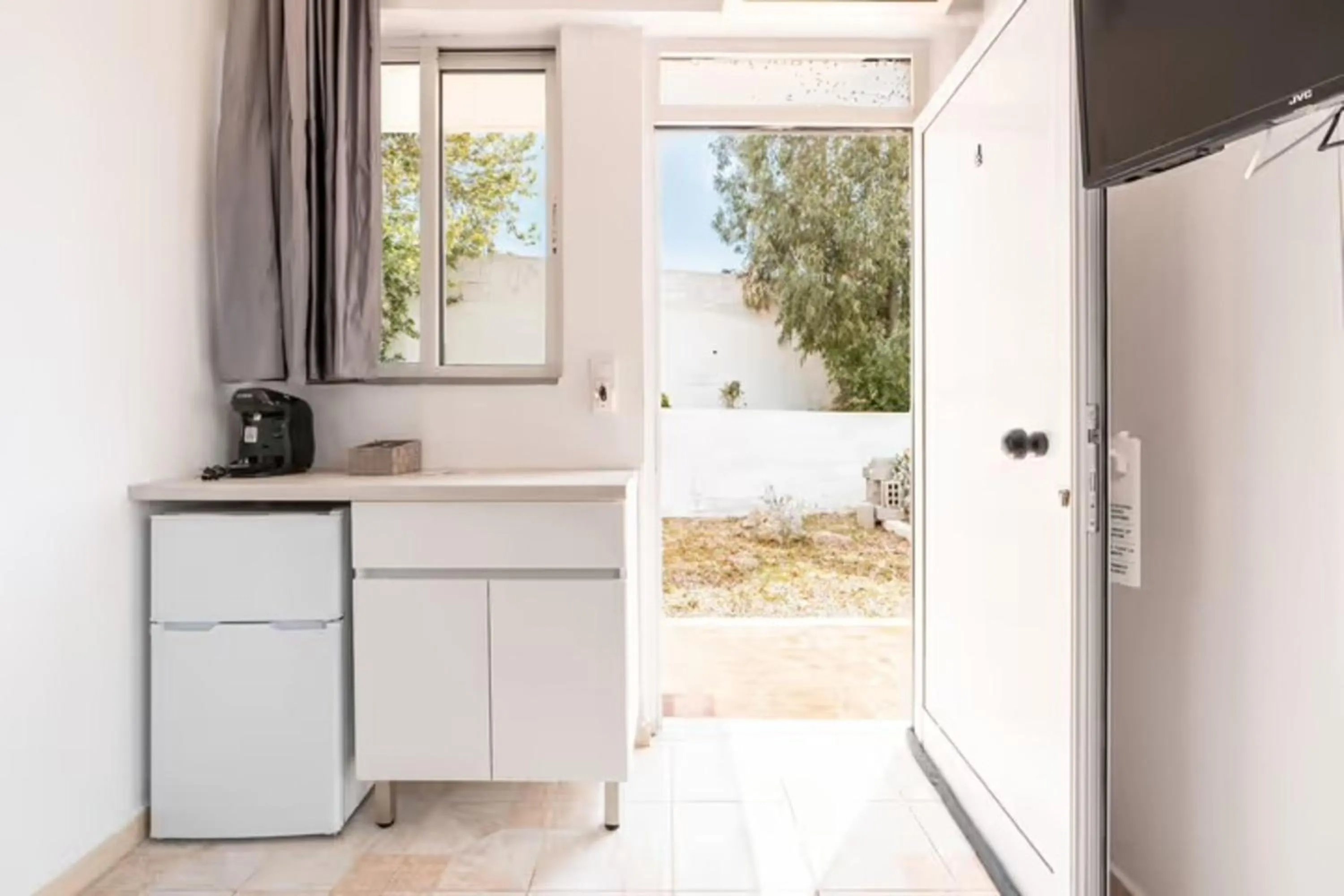 Kitchen or kitchenette in Eva's Rooms