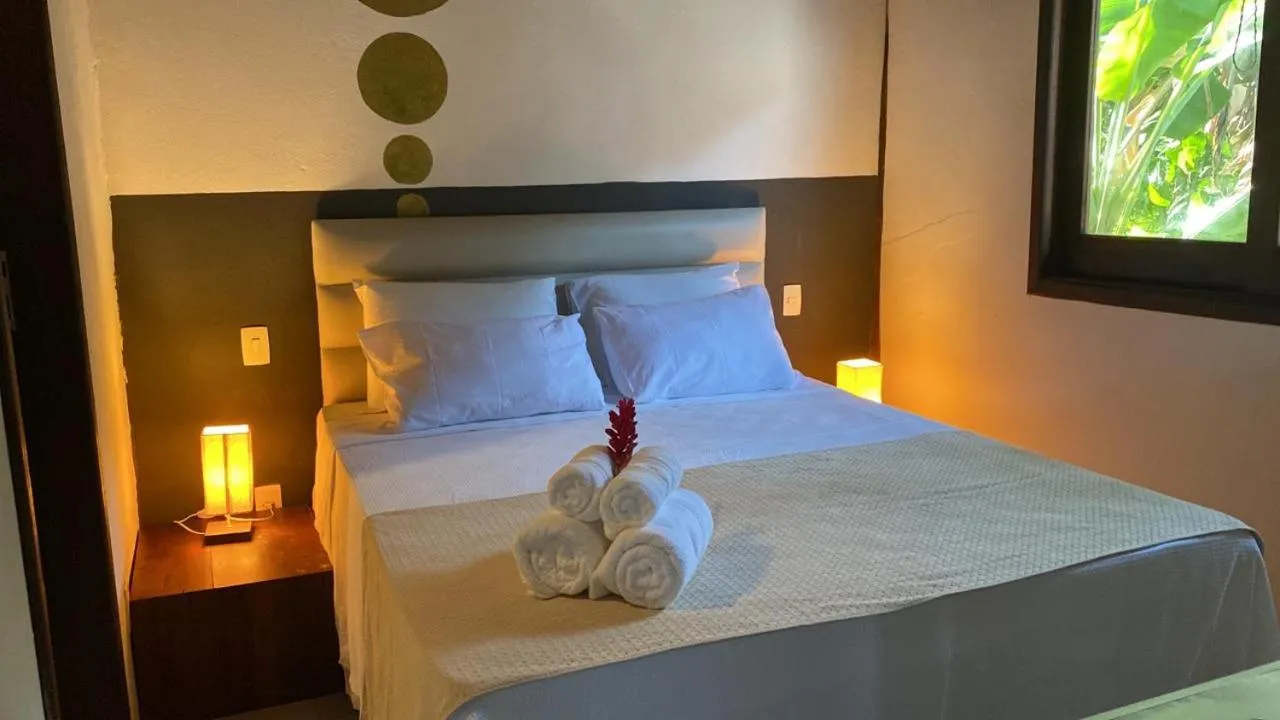 Bed in Pousada Bambu Dourado