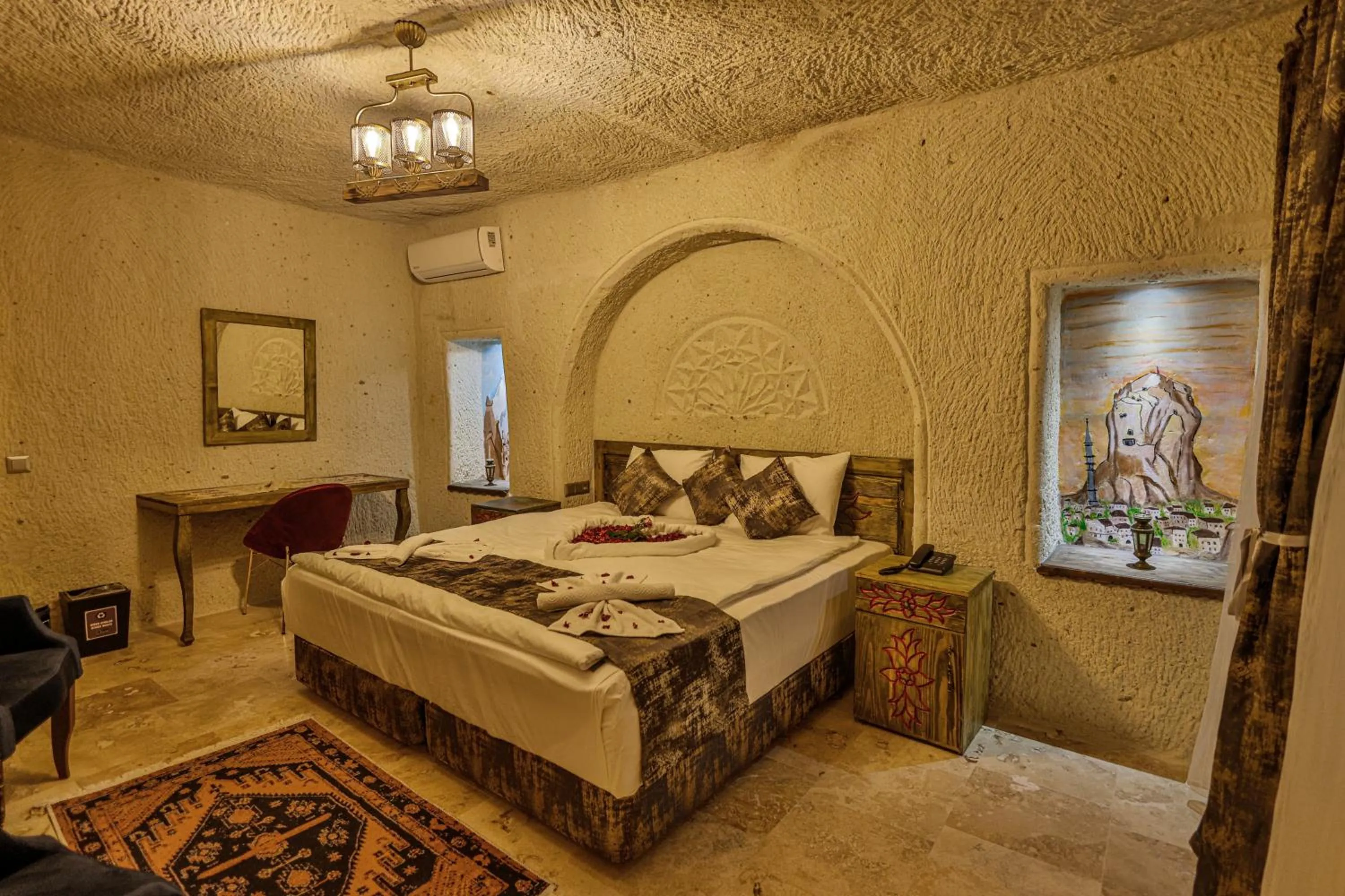 Photo of the whole room, Bed in CaveAdocia Stone&Cave Hotel