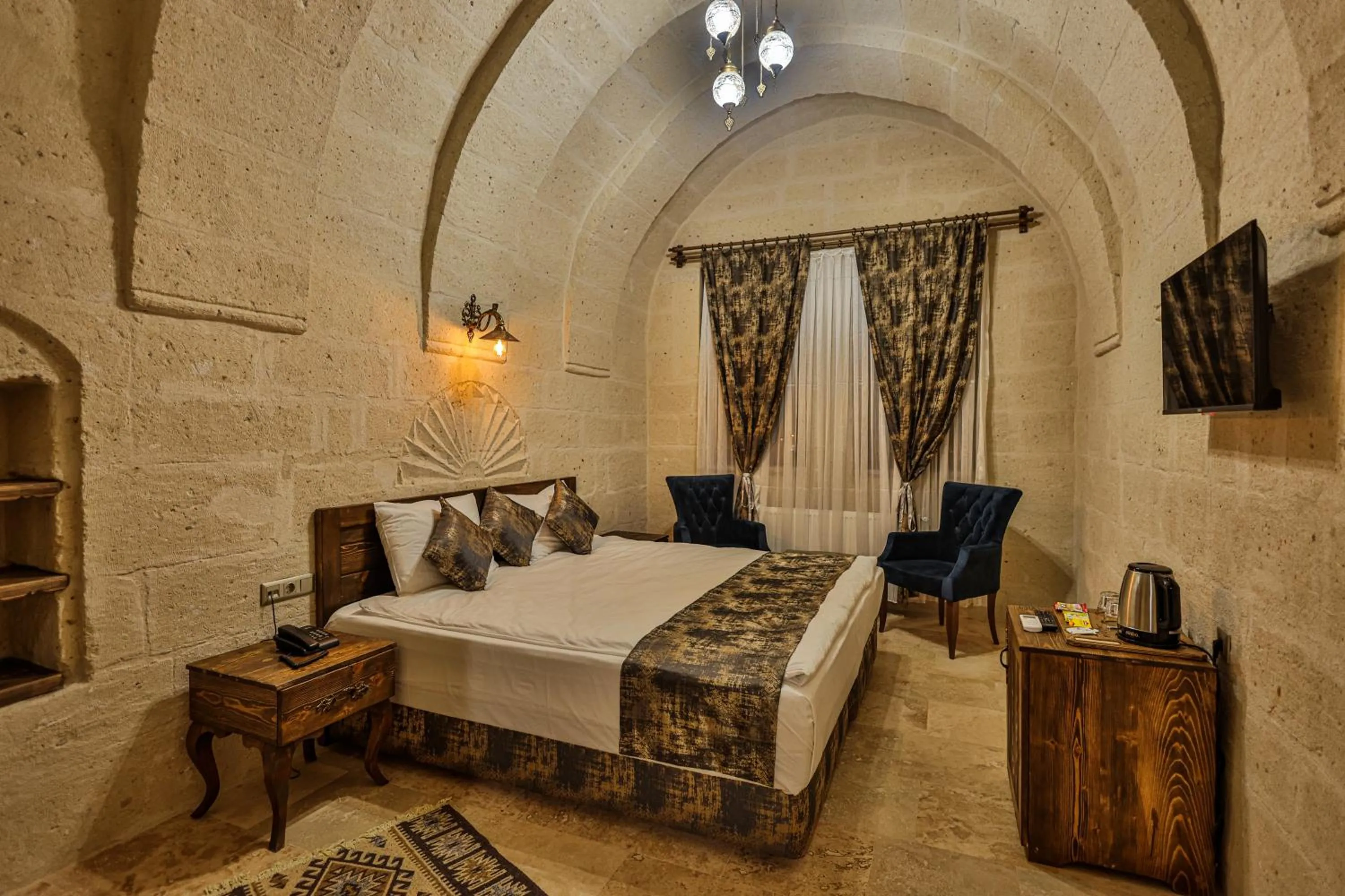 Bed in CaveAdocia Stone&Cave Hotel