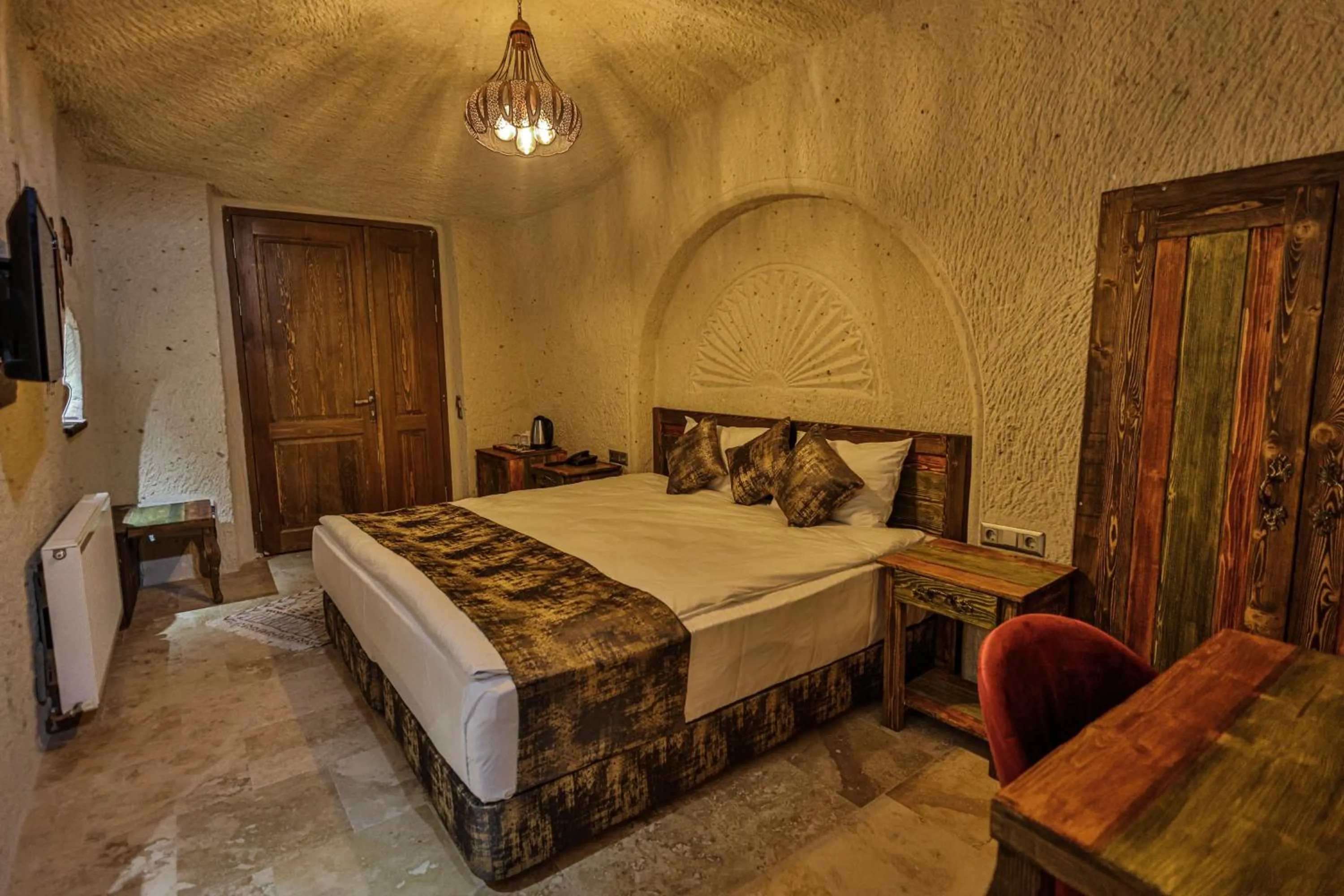 Photo of the whole room, Bed in CaveAdocia Stone&Cave Hotel