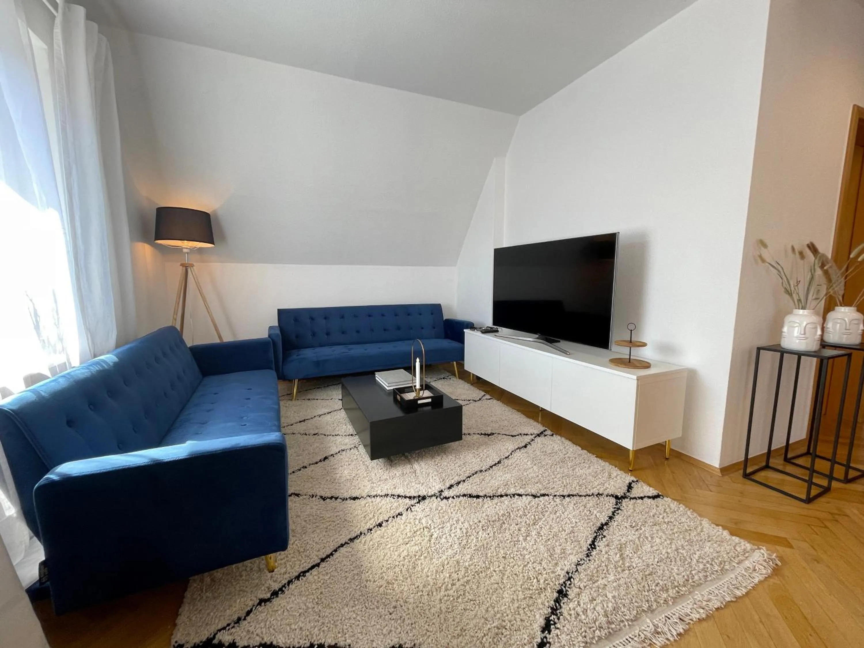 Communal lounge/ TV room in Design Maisonette I Kamin I 10 Personen I Netflix