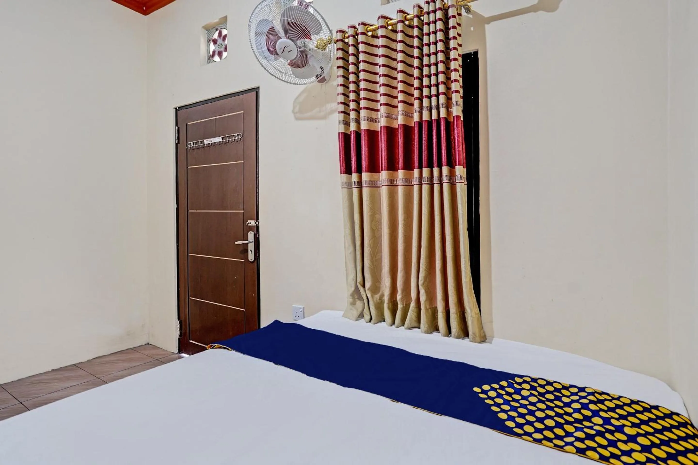 Bedroom in Hotel O Penginapan Kangean SyariahNearTaman Merdeka Kalianget