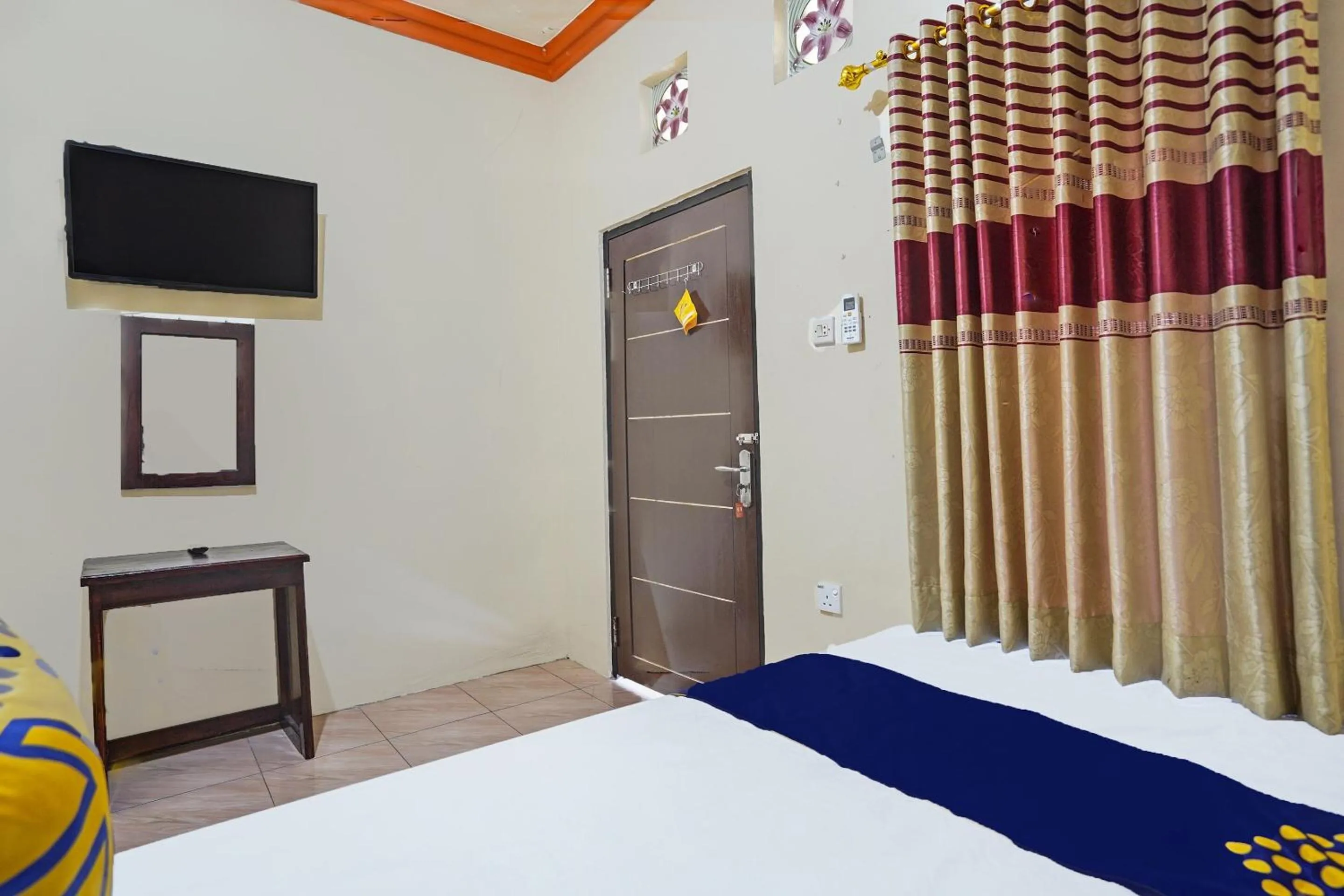 Bedroom in Hotel O Penginapan Kangean SyariahNearTaman Merdeka Kalianget