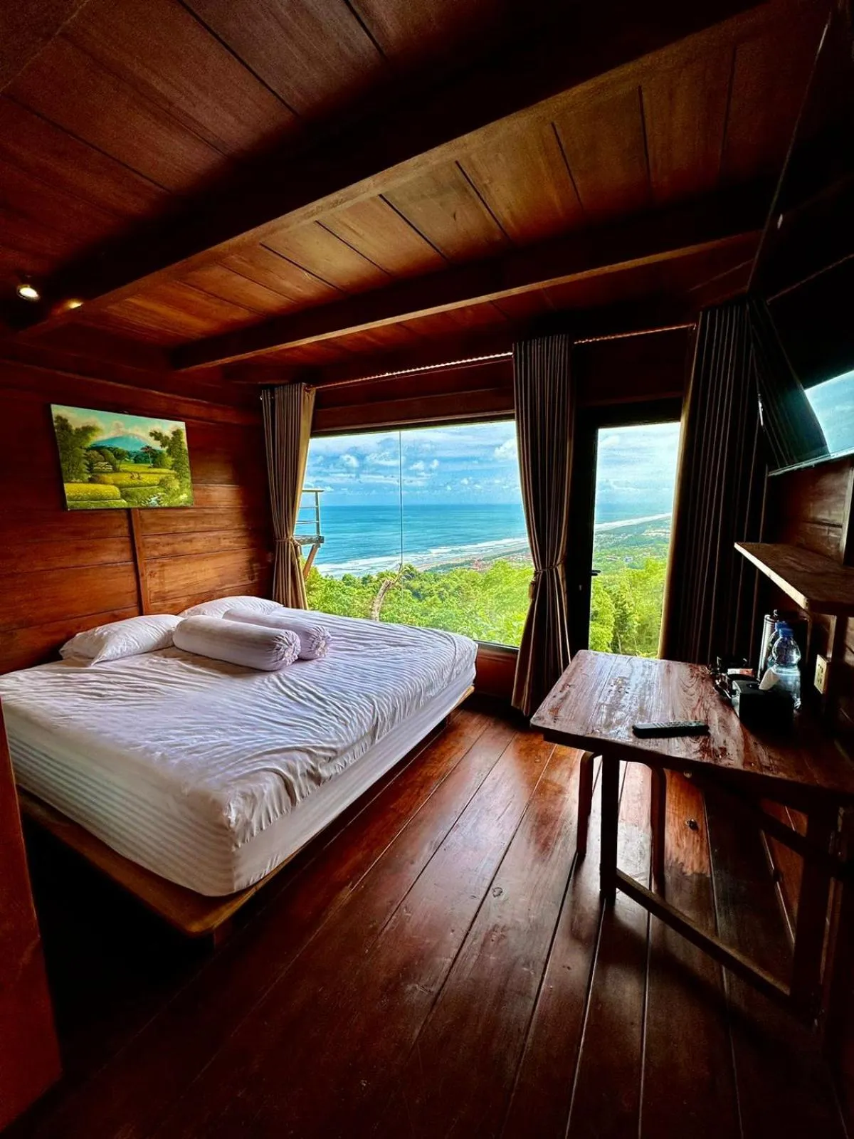 Bed in Glamping Omah Kayu at Watu Paris Jogja