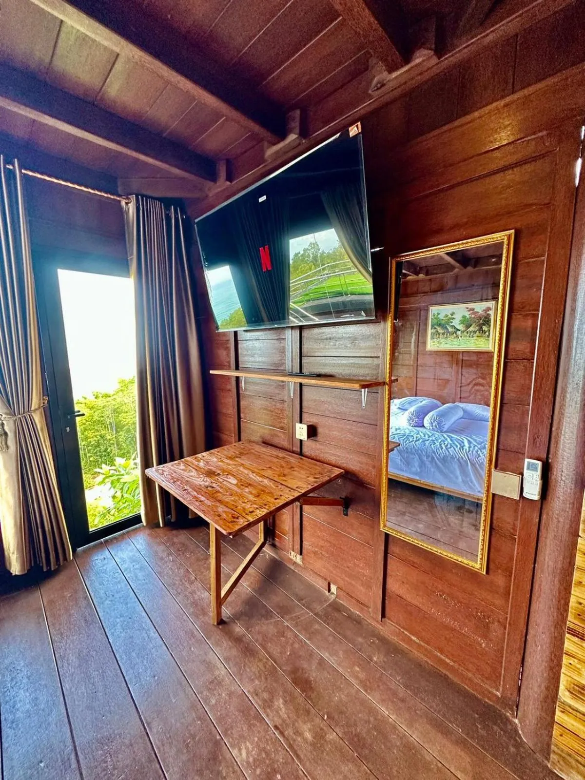 TV and multimedia in Glamping Omah Kayu at Watu Paris Jogja