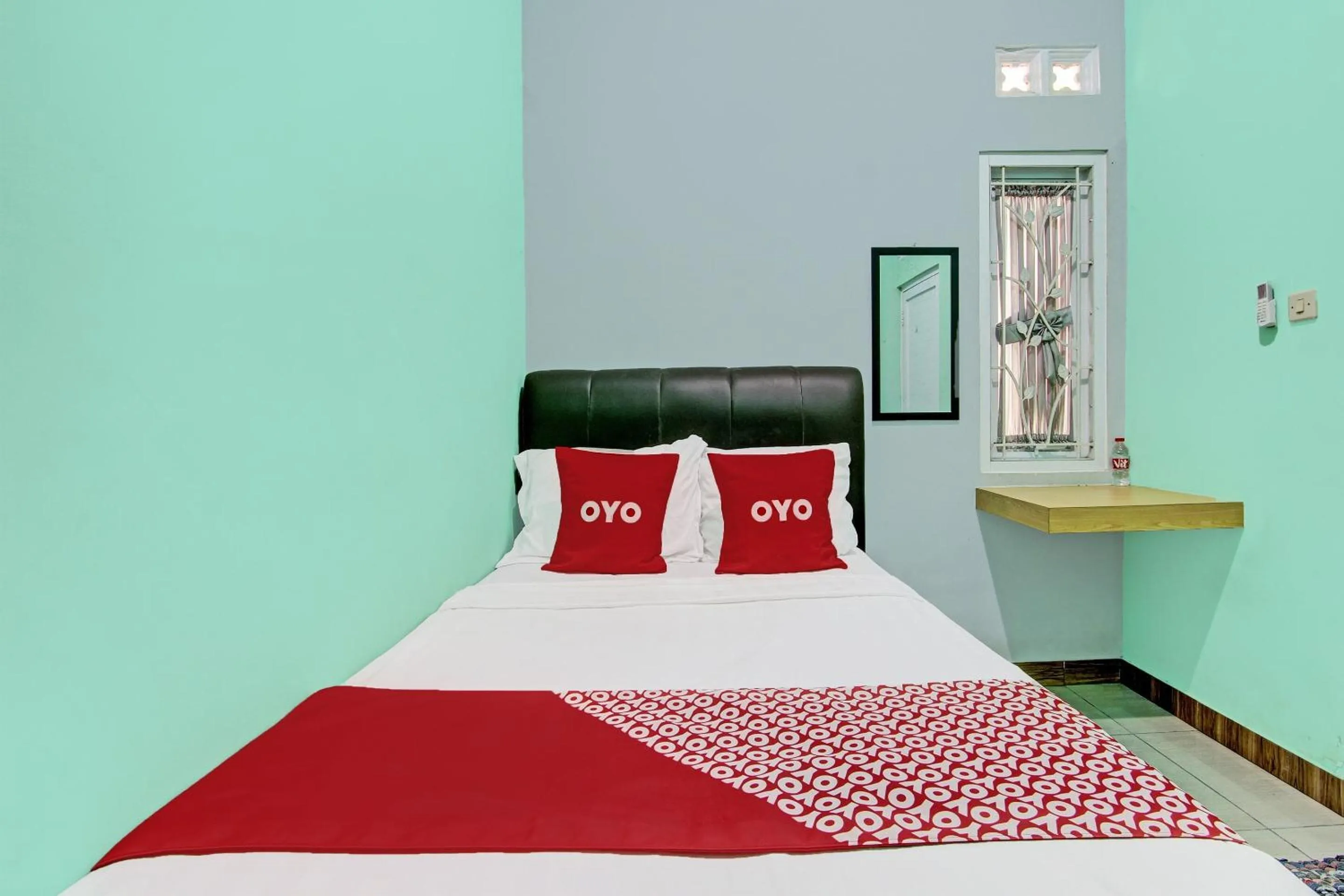 Bedroom in Hotel O Guest House Inayah Syariah