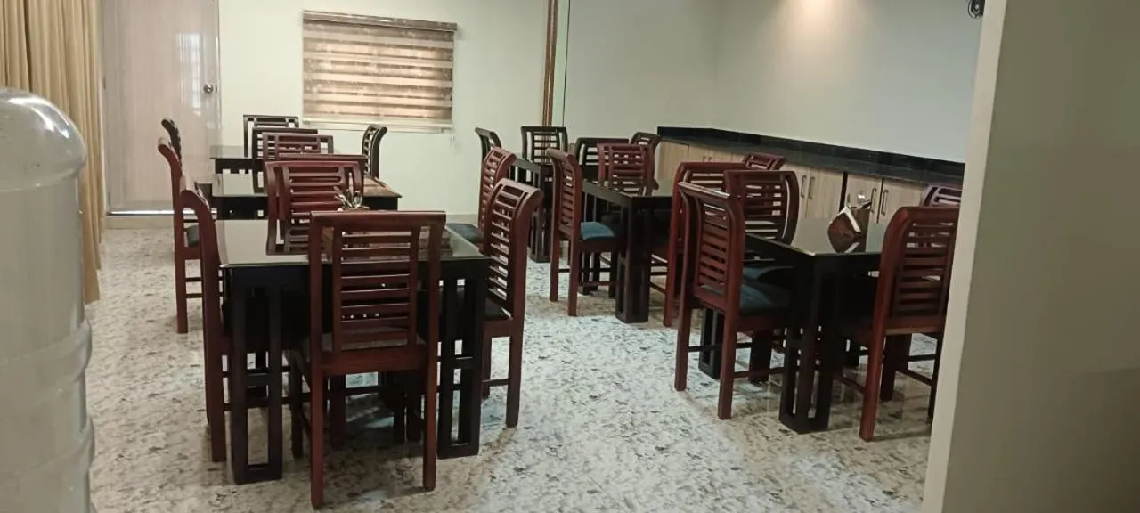 Dining area in Treebo Love Shore Residency, Near Lakeshore Hospital