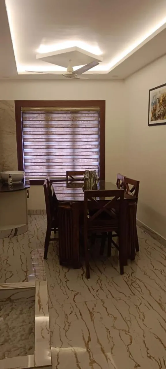 Dining area in Treebo Love Shore Residency, Near Lakeshore Hospital