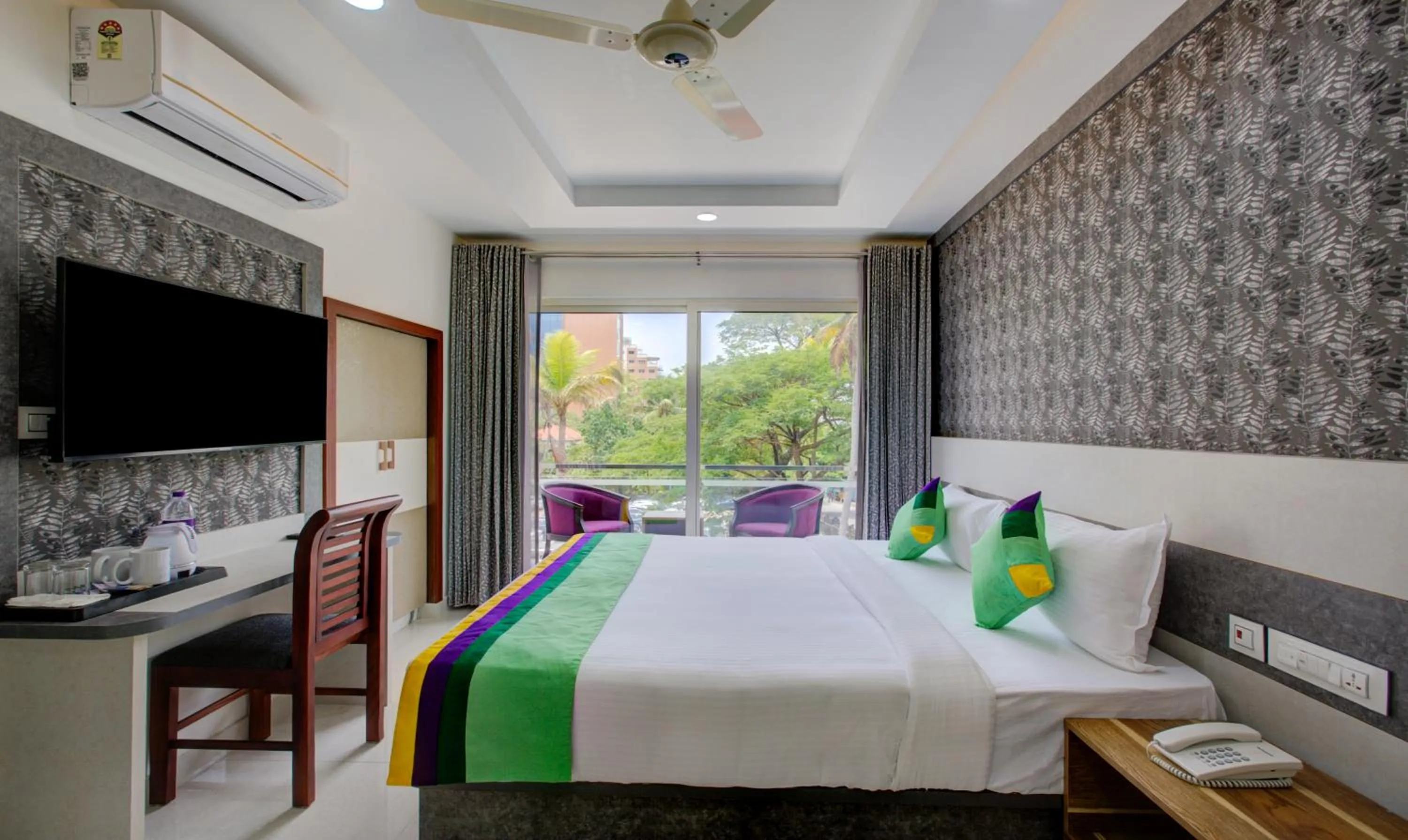 TV and multimedia, Bed in Treebo Love Shore Residency, Near Lakeshore Hospital