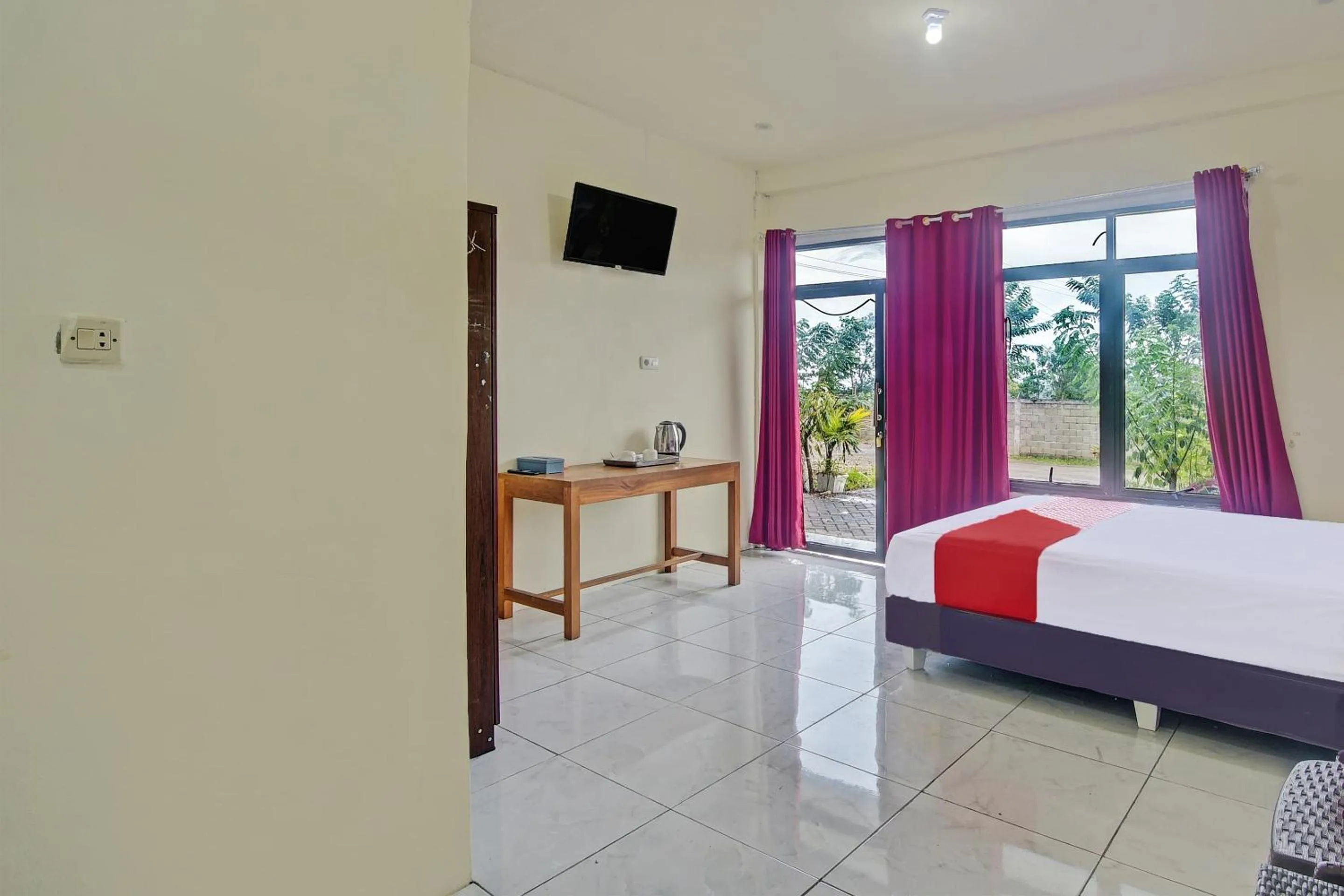 Bedroom, Bed in Hotel O Wawi Kadio Homestay