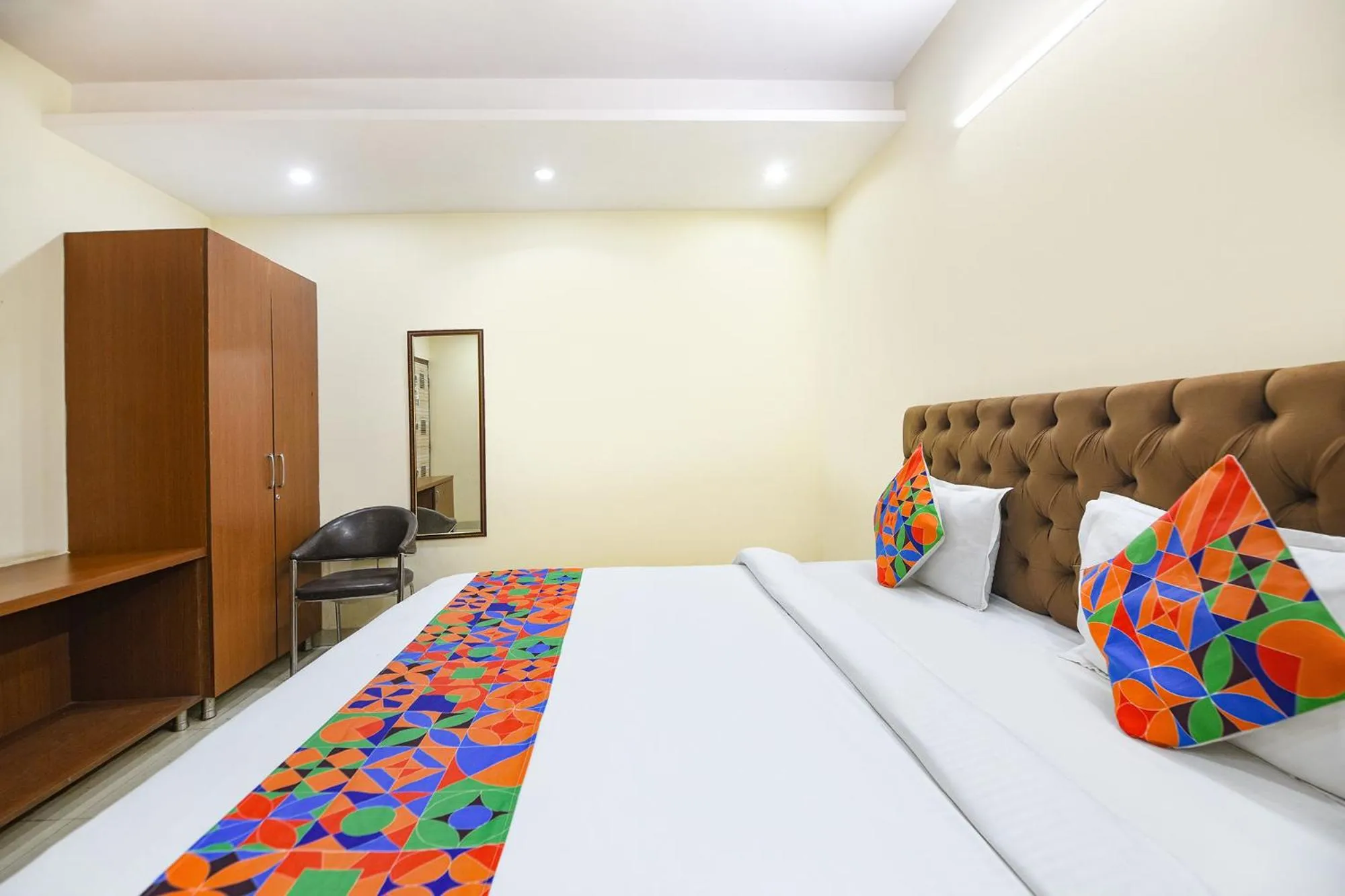 Bedroom in FabHotel Mannat Bhera Enclave