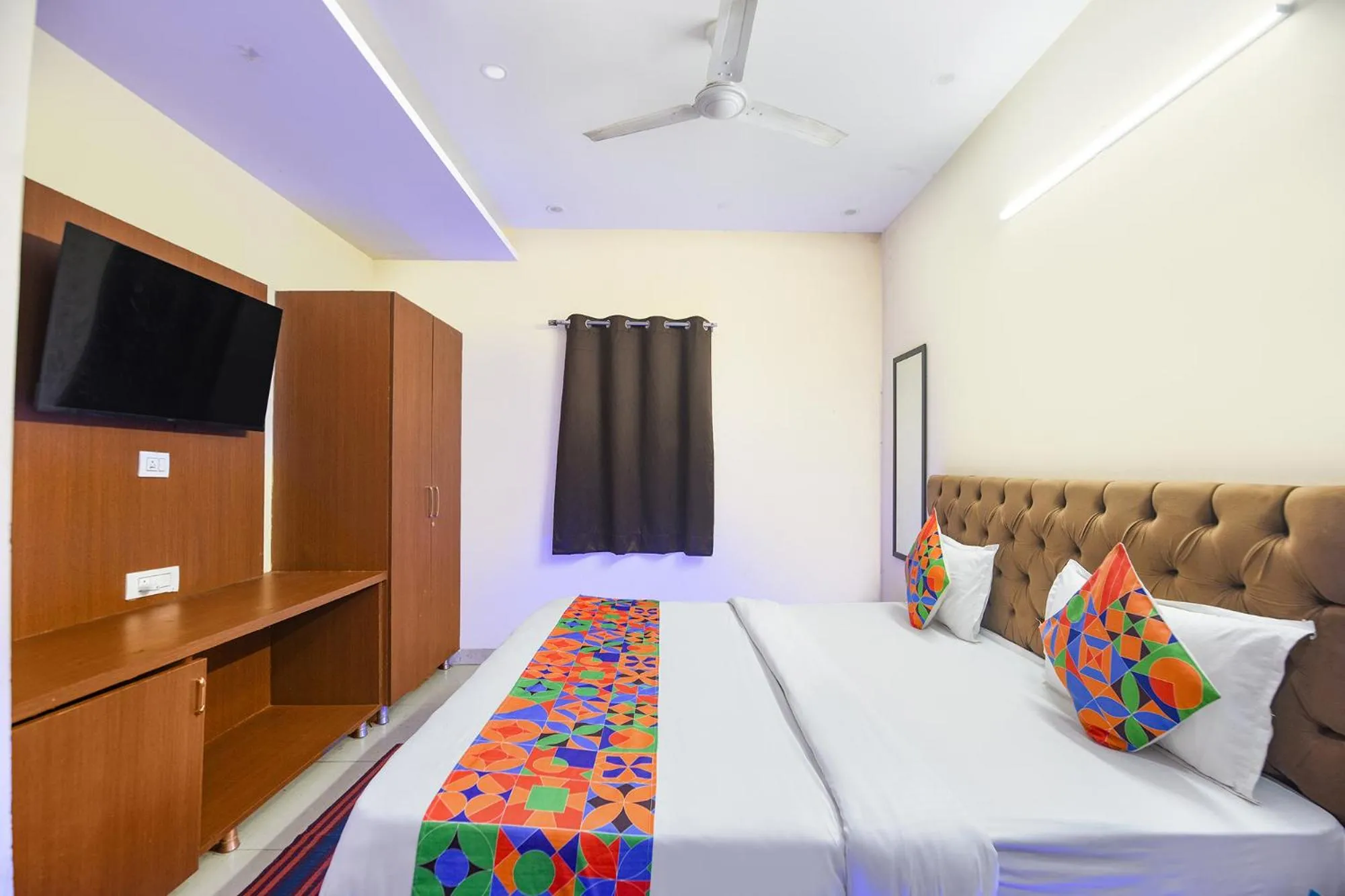 Bed in FabHotel Mannat Bhera Enclave