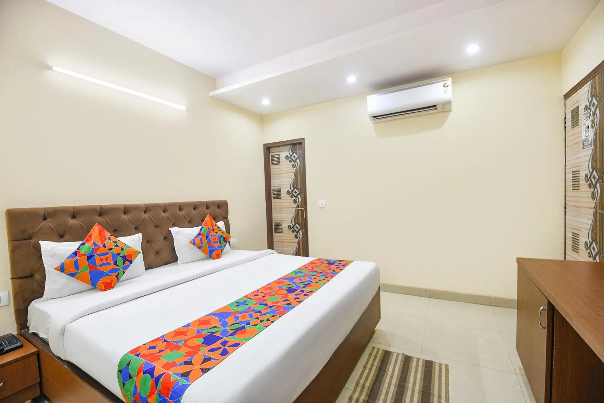 Bed in FabHotel Mannat Bhera Enclave