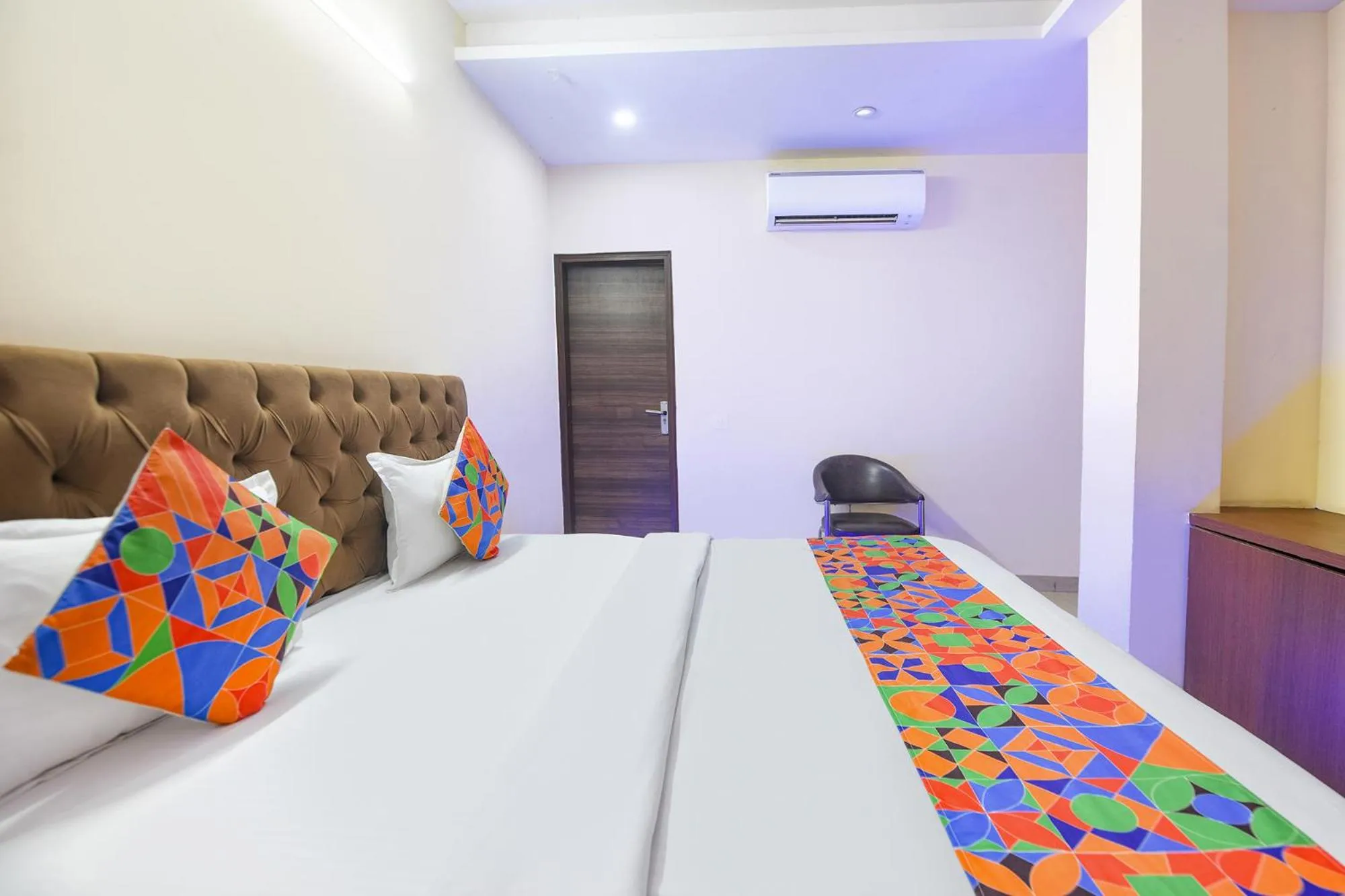 Bedroom in FabHotel Mannat Bhera Enclave