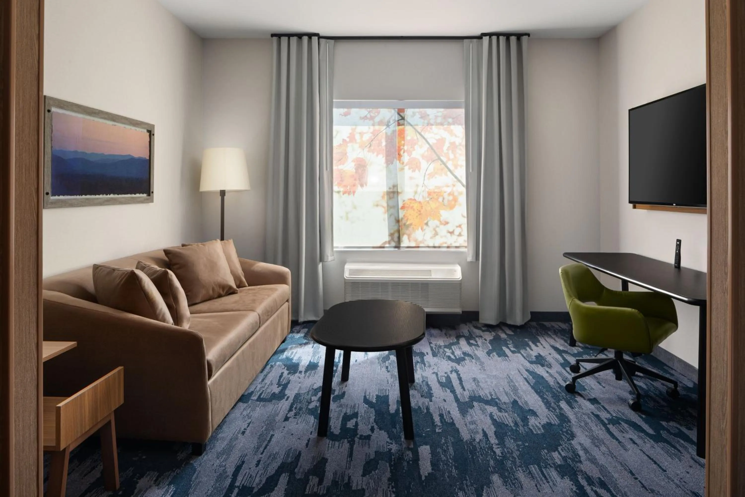 Living room in Fairfield by Marriott Inn & Suites Whitsett Greensboro East