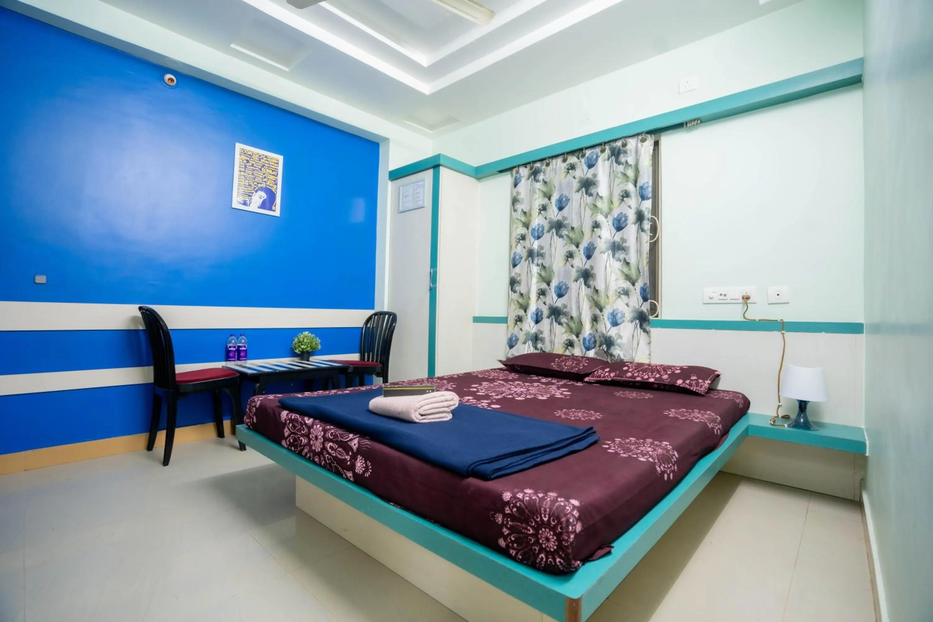 Bed in Sree Theja Residency