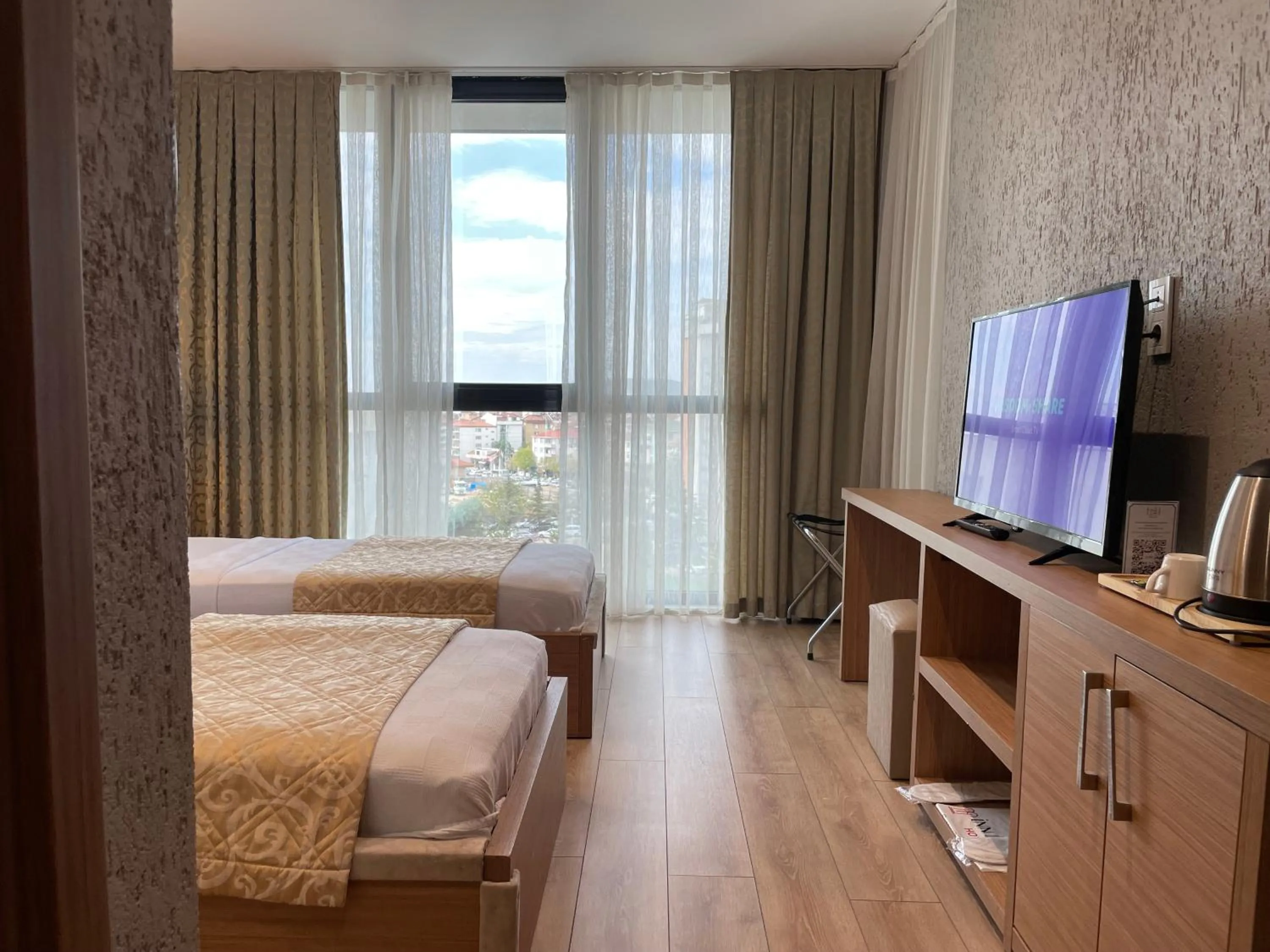 Bed in İNNPORT HOTEL