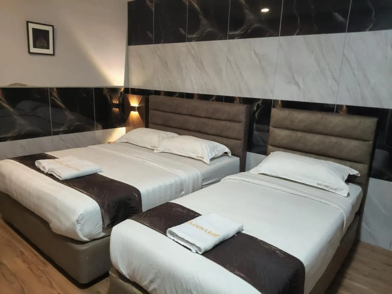 Bed in Golden Leaf Boutique Hotel Nusa Idaman Formerly Known as Ariana Hotel