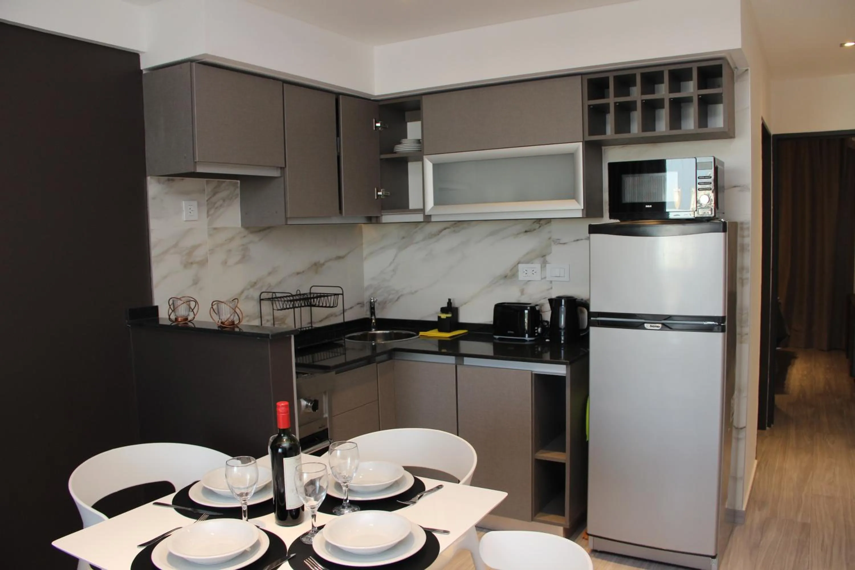 Kitchen or kitchenette in In House BA - Le coq