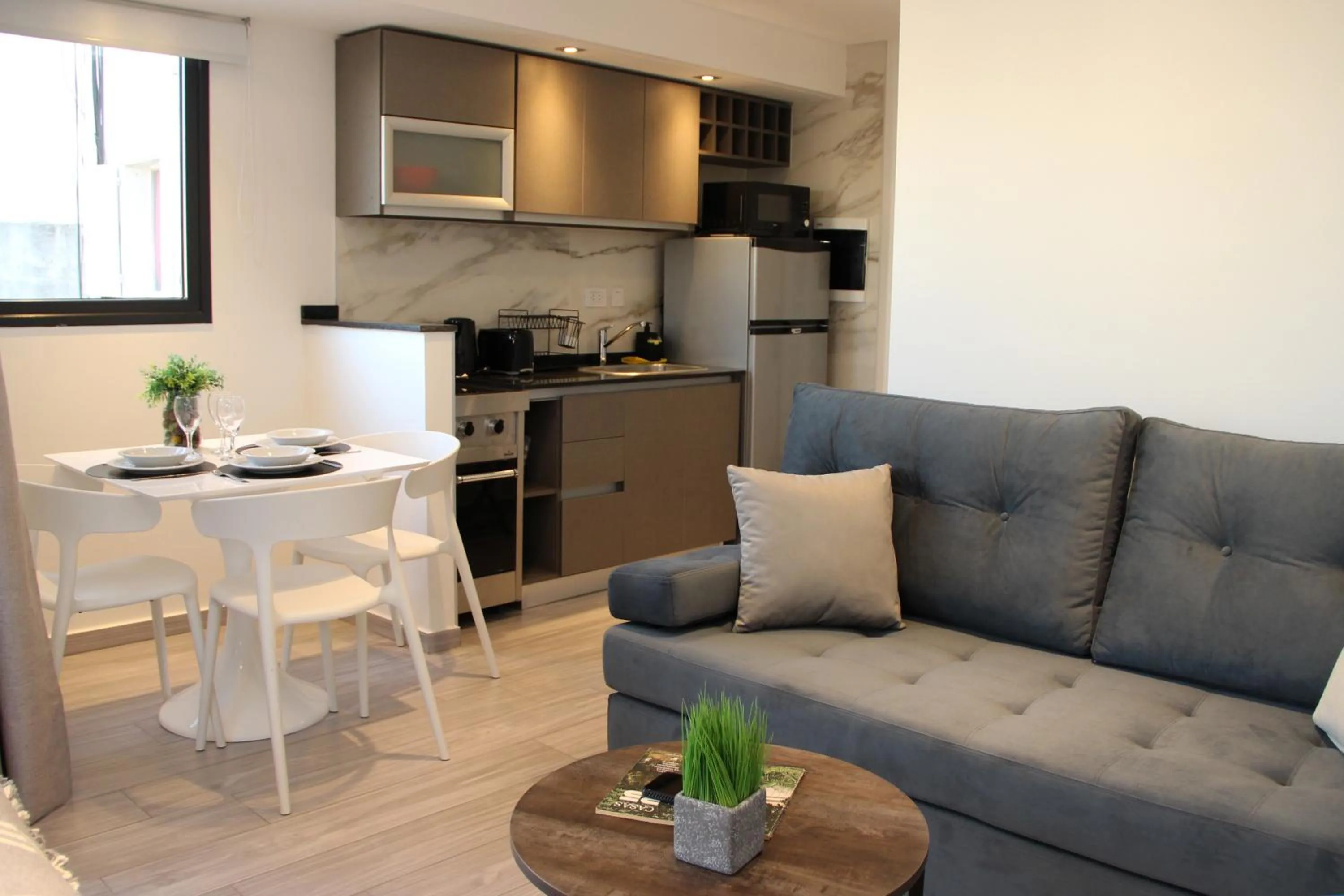 Kitchen or kitchenette in In House BA - Le coq